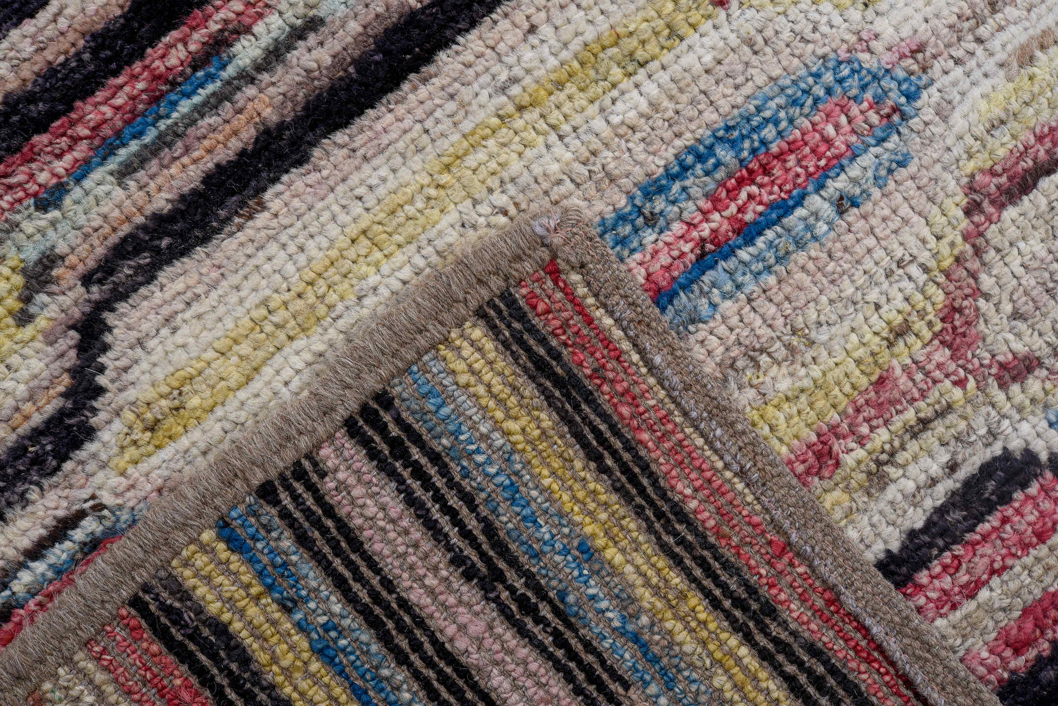 7' x 9' one-of-a-kind handmade vintage Tulu large size rug. Color palette: ivory, rose, charcoal, sky blue, gold, coral