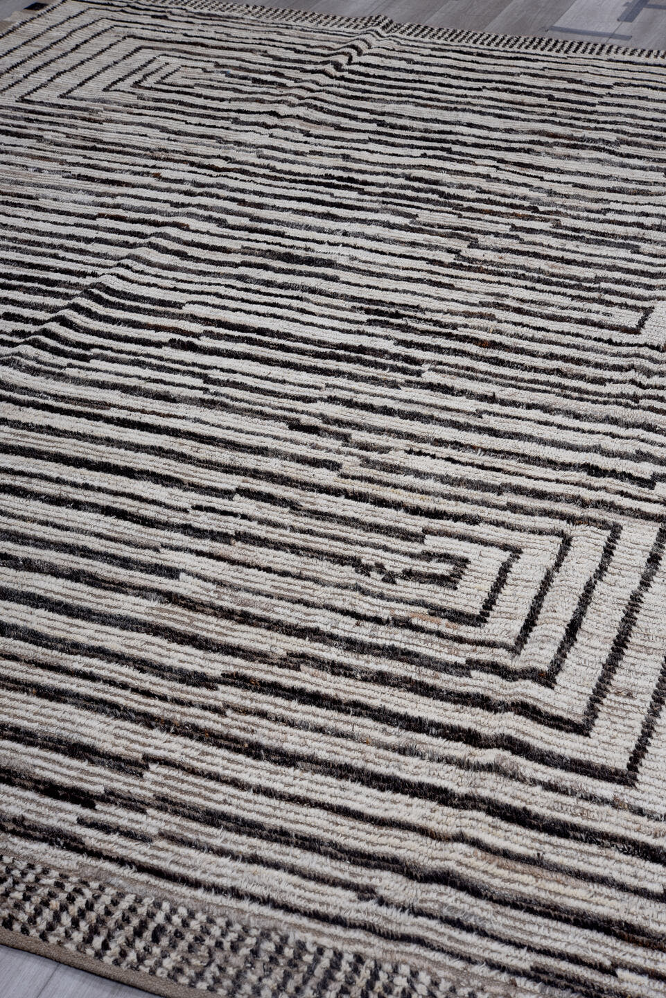 9' x 11' one-of-a-kind handmade vintage Tulu large size rug. Color palette: ivory, taupe, charcoal, brown, cream, black