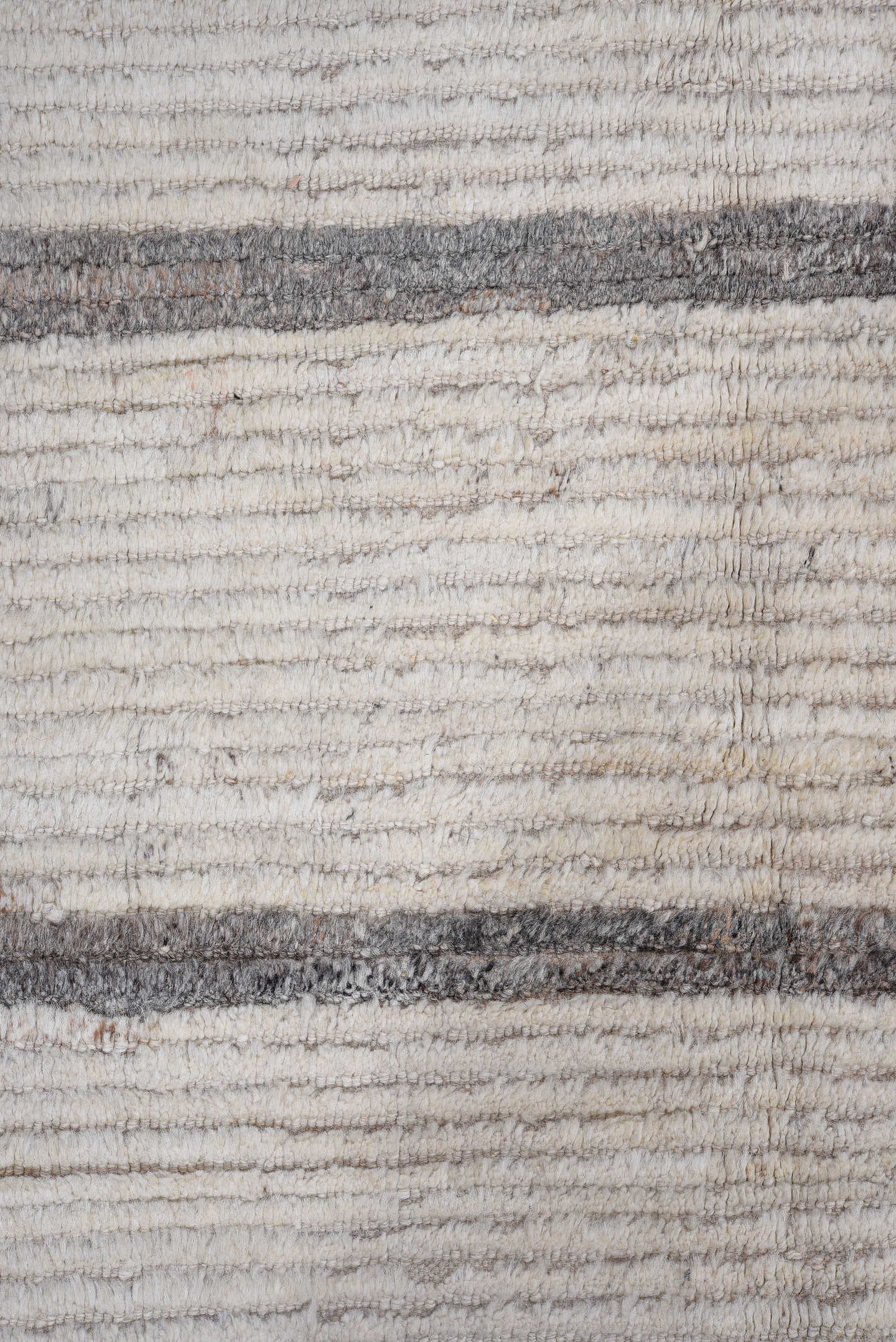 14' x 17' one-of-a-kind handmade vintage Tulu oversize rug. Color palette: ivory, charcoal, taupe, gray, black, beige