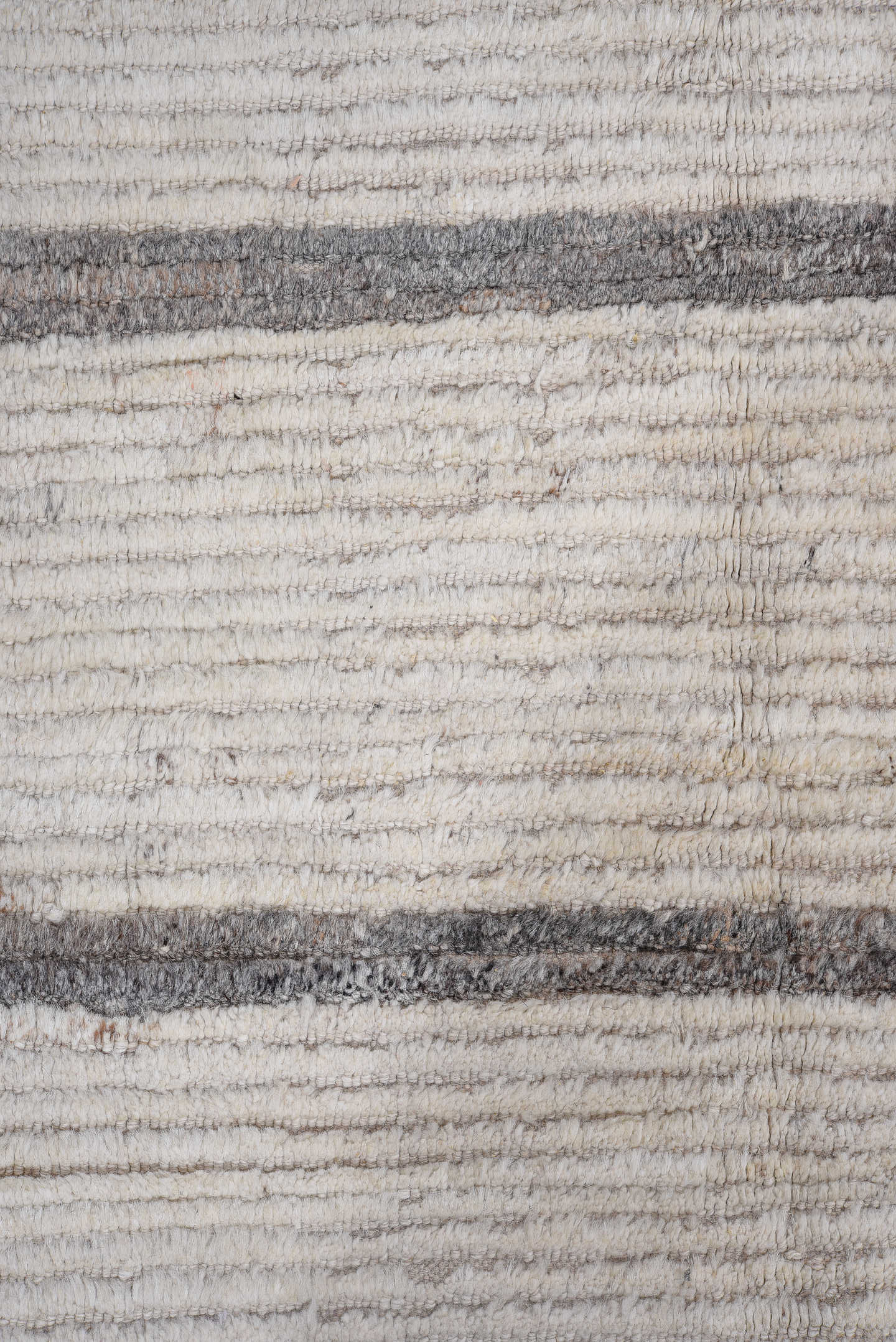 14' x 17' one-of-a-kind handmade vintage Tulu oversize rug. Color palette: ivory, charcoal, taupe, gray, black, beige