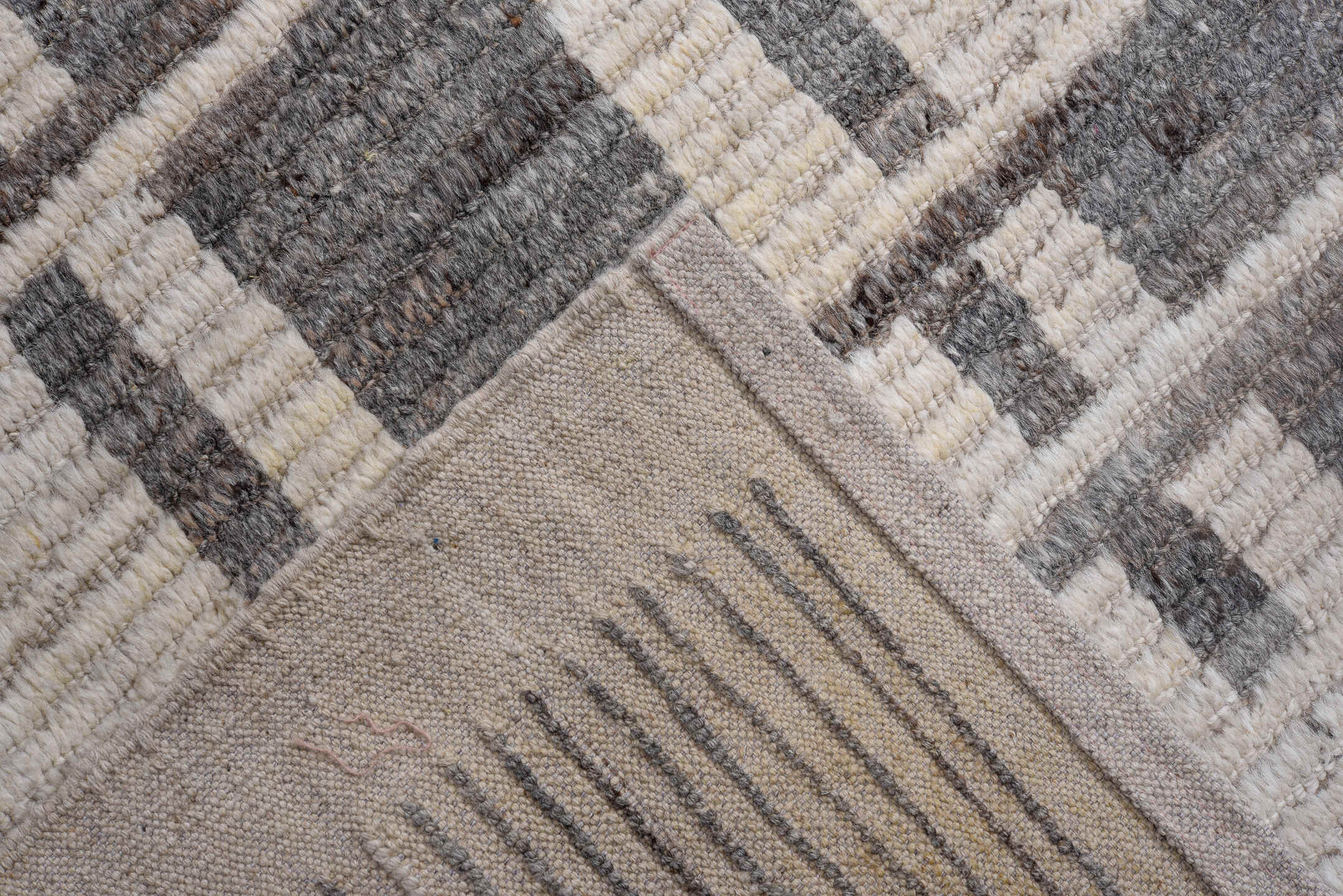 14' x 17' one-of-a-kind handmade vintage Tulu oversize rug. Color palette: ivory, charcoal, taupe, gray, black, beige