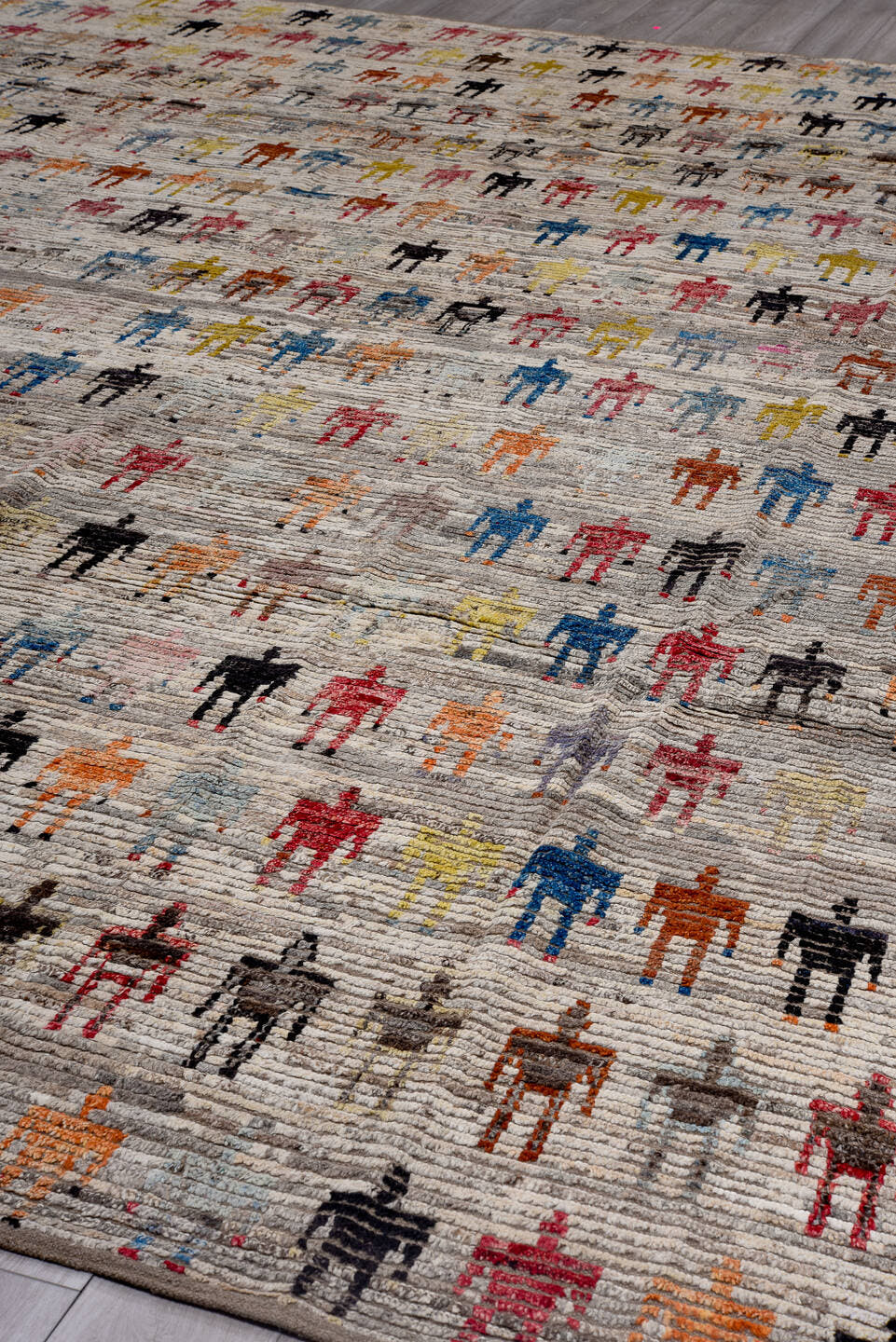 13' x 16' one-of-a-kind handmade vintage Tulu oversize rug. Color palette: ivory, gray, pink, charcoal, sky blue, gold