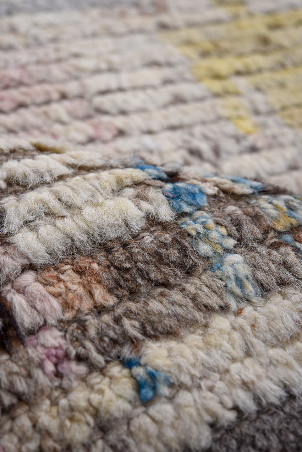 13' x 16' one-of-a-kind handmade vintage Tulu oversize rug. Color palette: ivory, gray, pink, charcoal, sky blue, gold