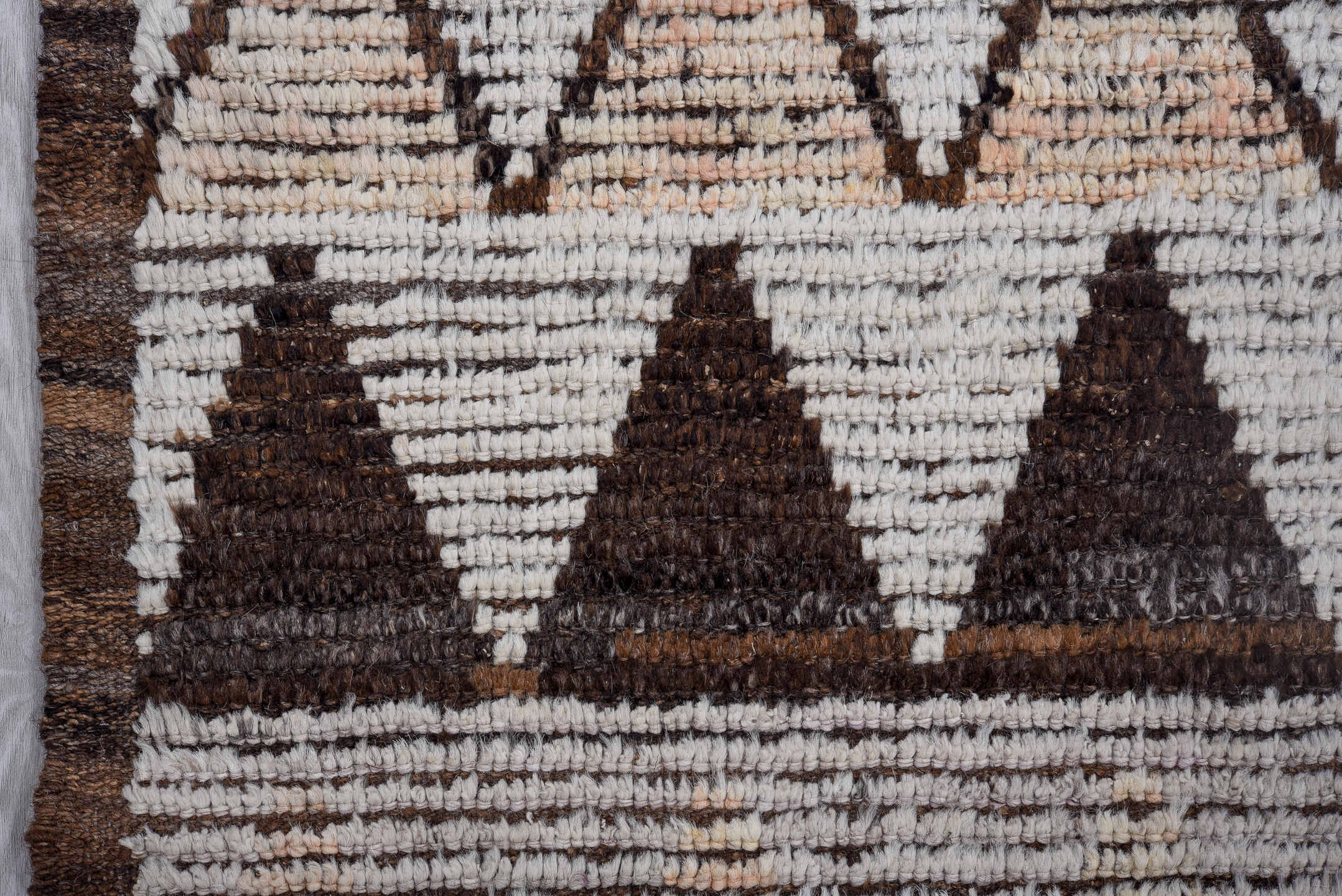 3' x 13' one-of-a-kind handmade vintage Tulu runner rug. Color palette: ivory, brown, blue, blush, burgundy, taupe, pink