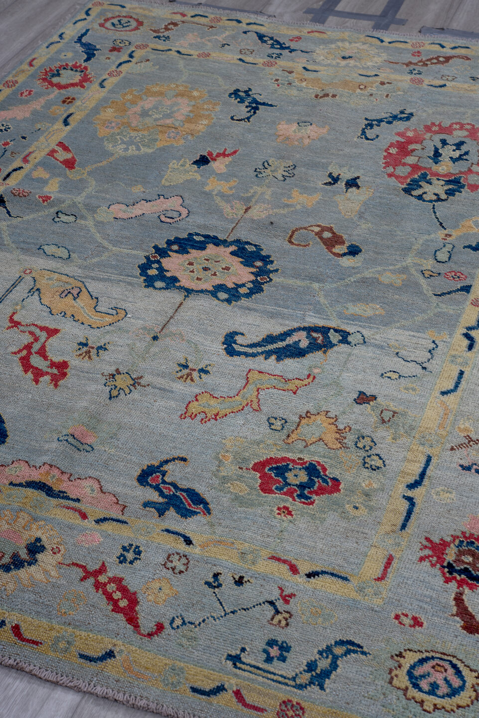 5' x 7' one-of-a-kind handmade vintage Oushak medium size rug. Color palette: light blue, ivory, navy, rose, gold, pink
