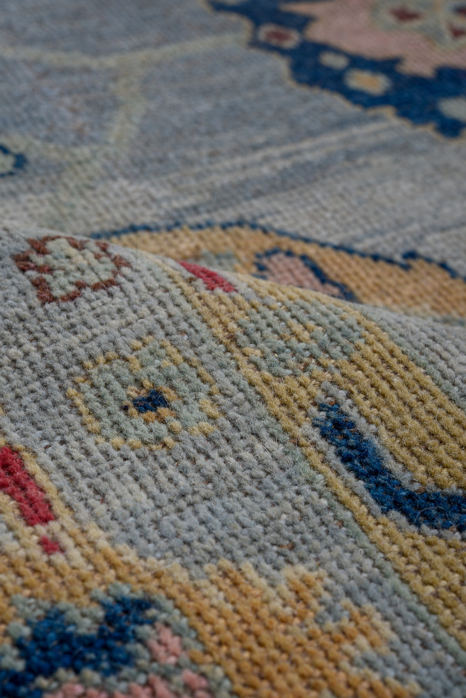 5' x 7' one-of-a-kind handmade vintage Oushak medium size rug. Color palette: light blue, ivory, navy, rose, gold, pink