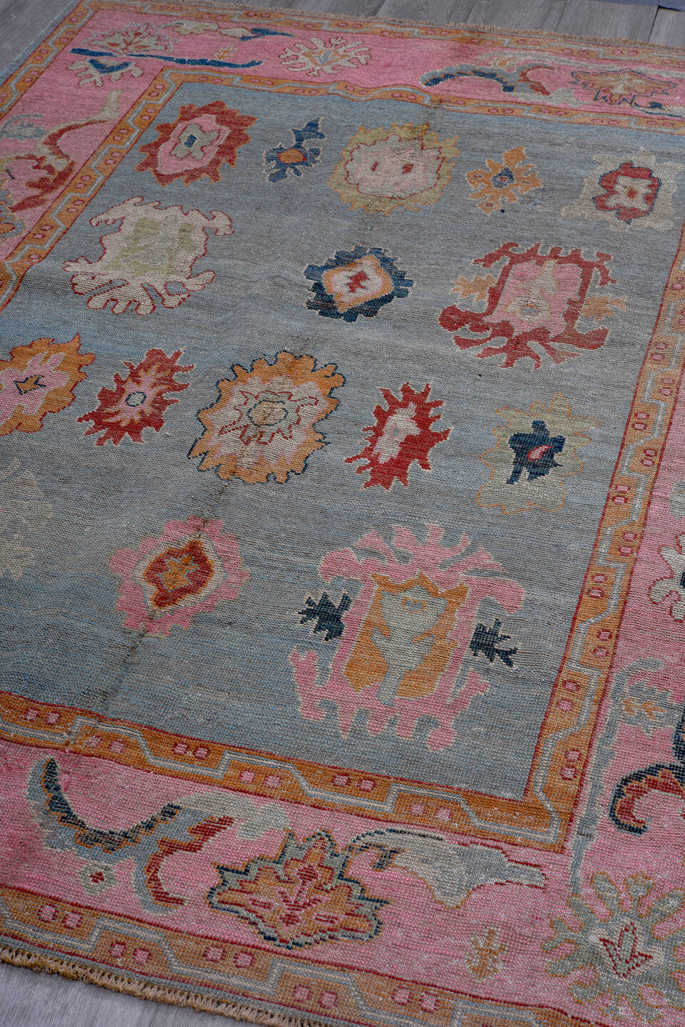 5' x 7' one-of-a-kind handmade vintage Oushak rug. Color palette: pink, pale blue, coral, ivory, slate, saffron, rose, sage