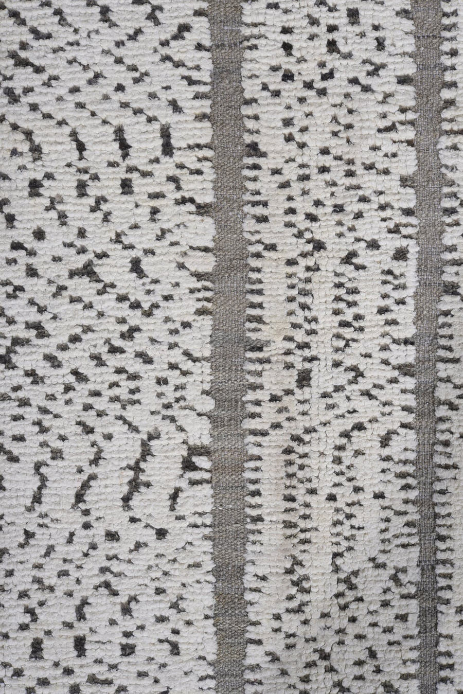 7' x 9' one-of-a-kind handmade vintage Tulu rug. Color palette: ivory, charcoal, taupe, gray, black, beige
