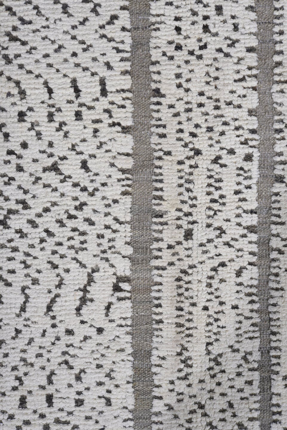 7' x 9' one-of-a-kind handmade vintage Tulu rug. Color palette: ivory, charcoal, taupe, gray, black, beige