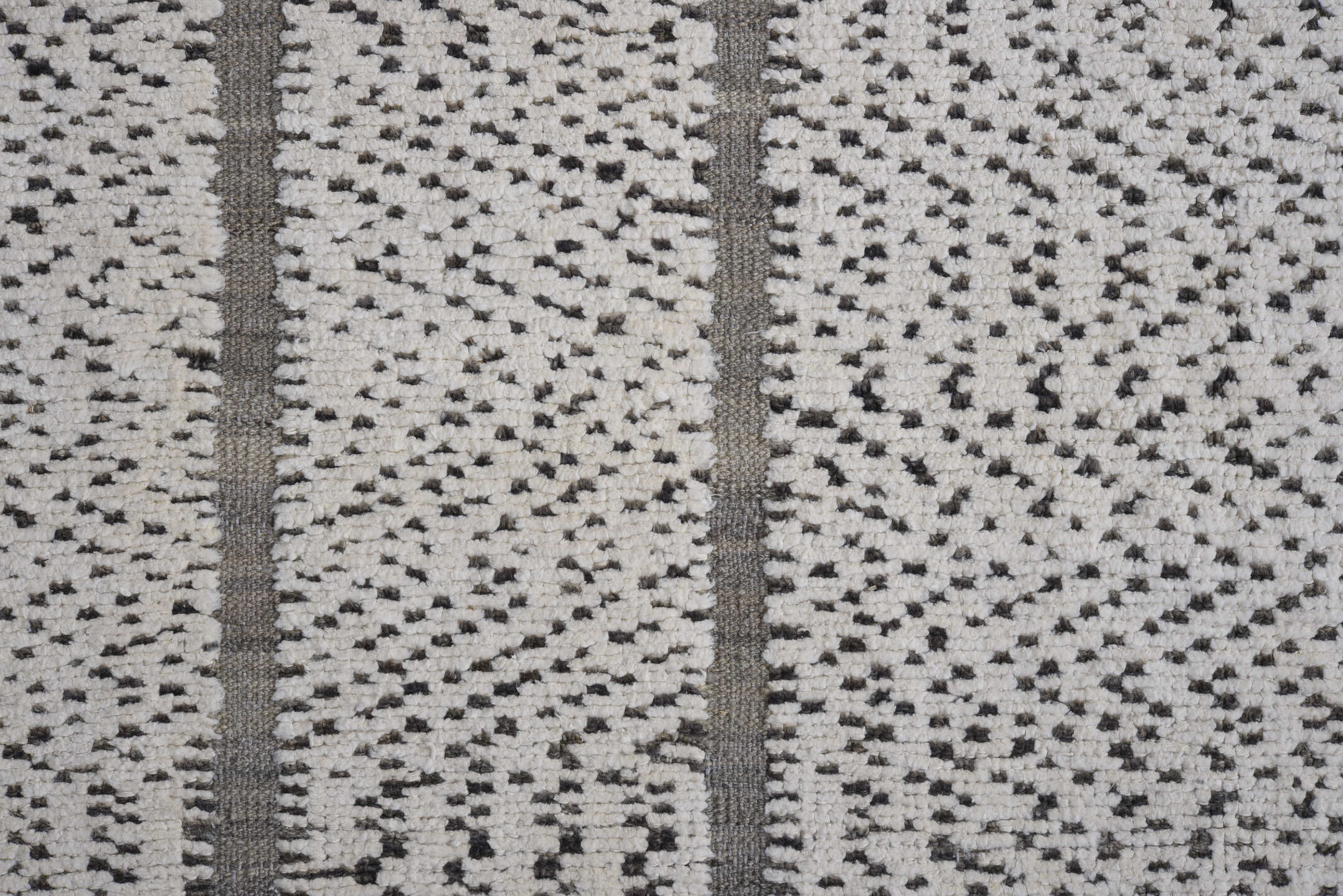 7' x 9' one-of-a-kind handmade vintage Tulu rug. Color palette: ivory, charcoal, taupe, gray, black, beige
