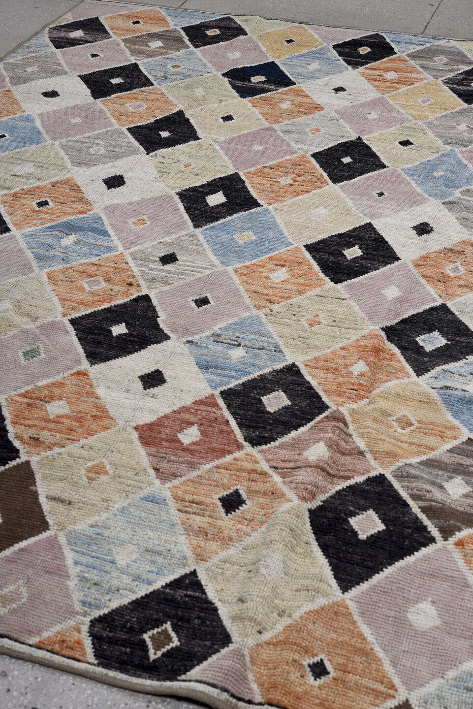 7' x 10' one-of-a-kind handmade vintage Tulu large size rug. Color palette: ivory, blush, charcoal, sky blue, terra cotta