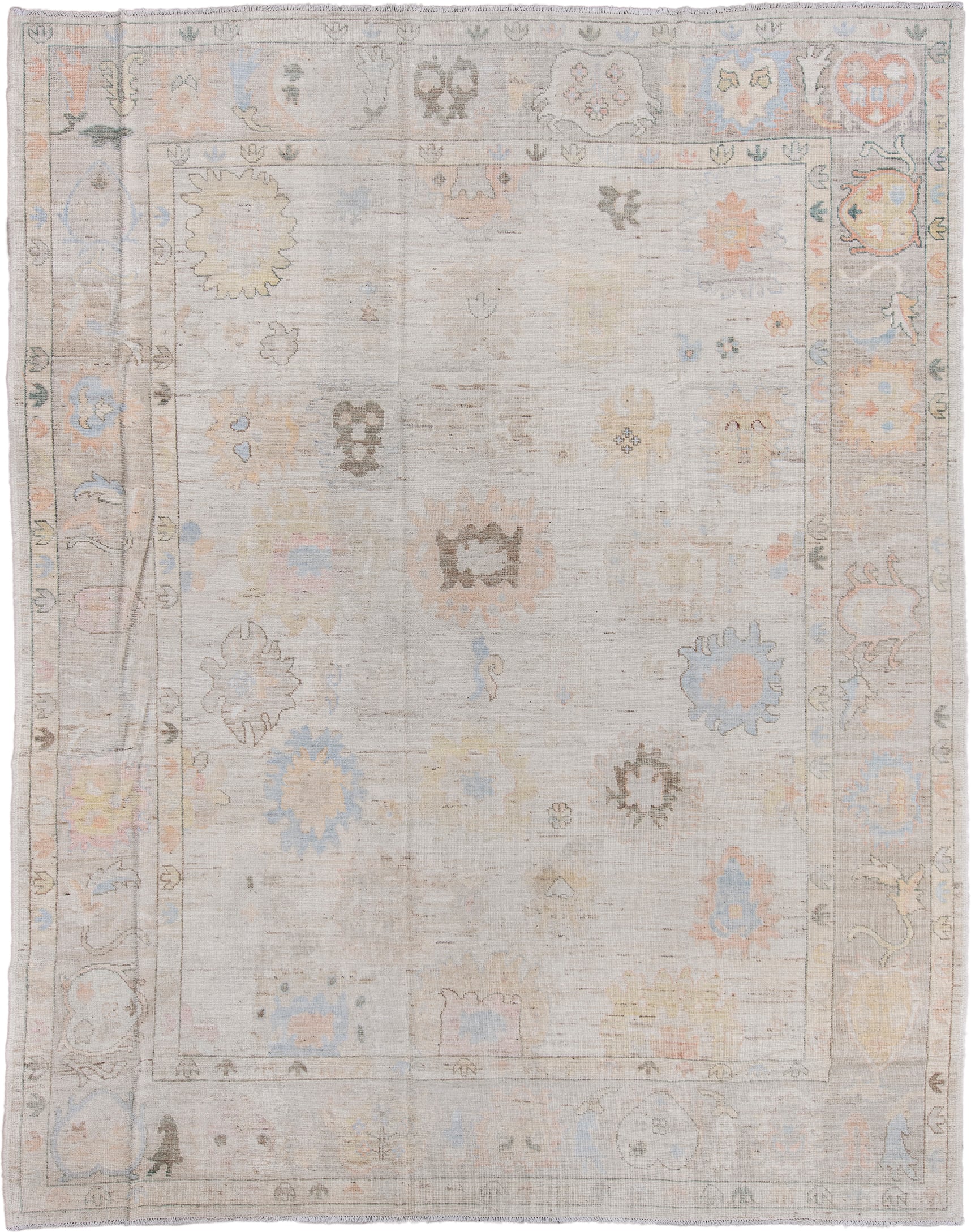 9' x 12' one-of-a-kind handmade vintage Oushak large size rug. Color palette: ivory, pale blue, taupe, peach, soft gold