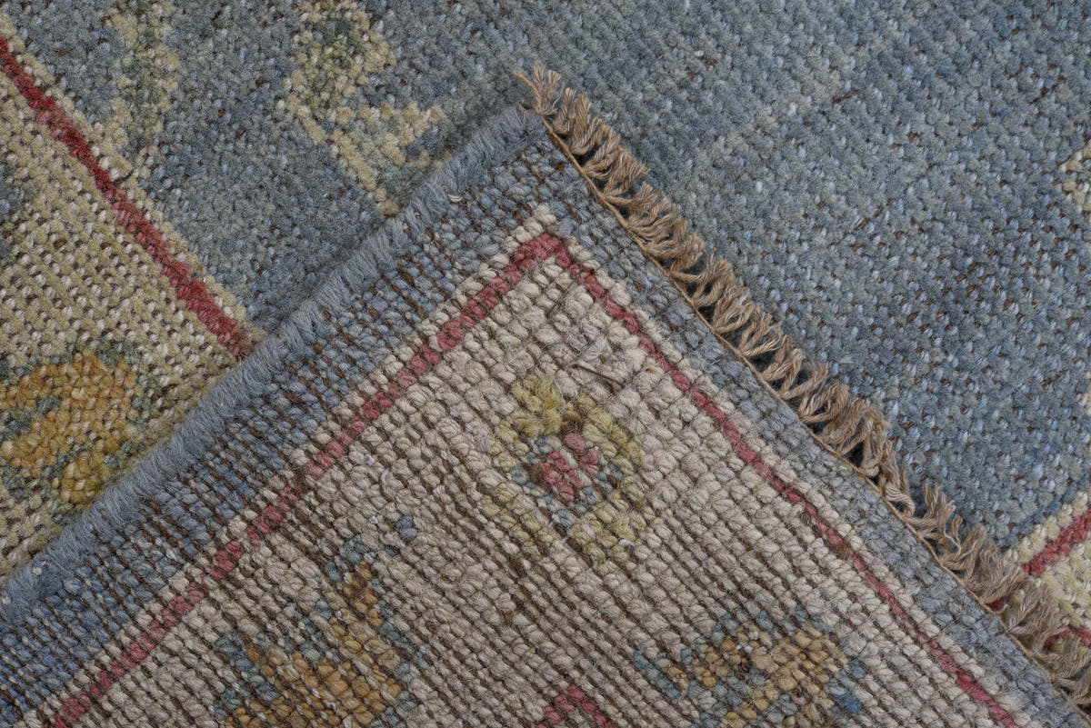 4' x 8' one-of-a-kind handmade vintage Oushak rug. Color palette: sky blue, ivory, beige, rust, sage, gold, slate