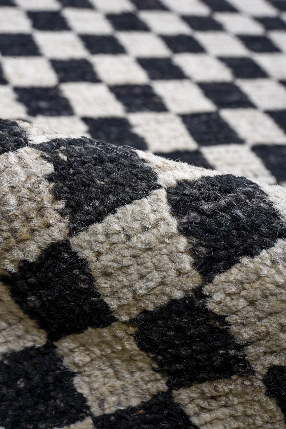 13' x 16' one-of-a-kind handmade vintage Tulu oversize rug. Color palette: ivory, black, charcoal, gray