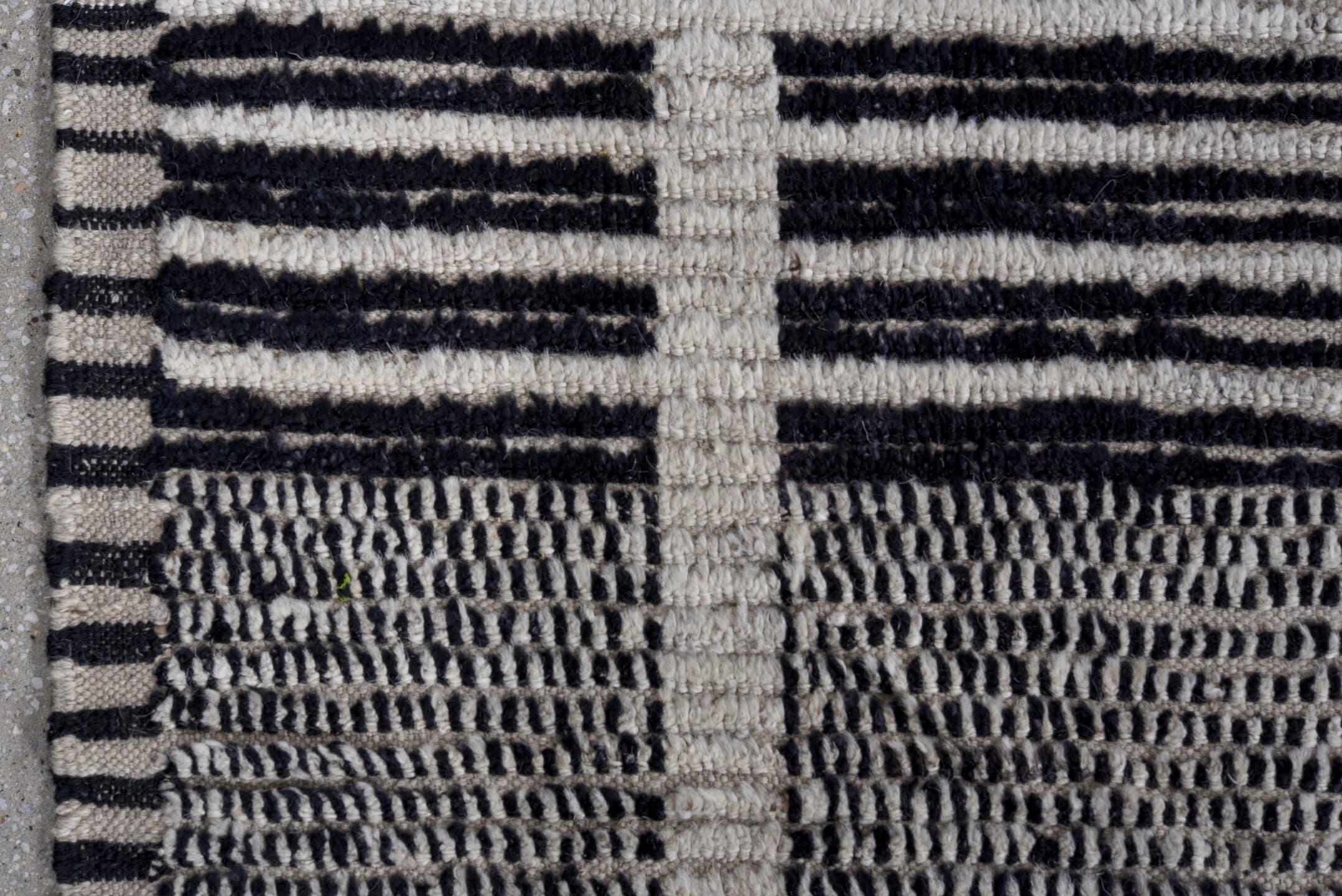 13' x 16' one-of-a-kind handmade vintage Tulu oversize rug. Color palette: ivory, charcoal, gray, black
