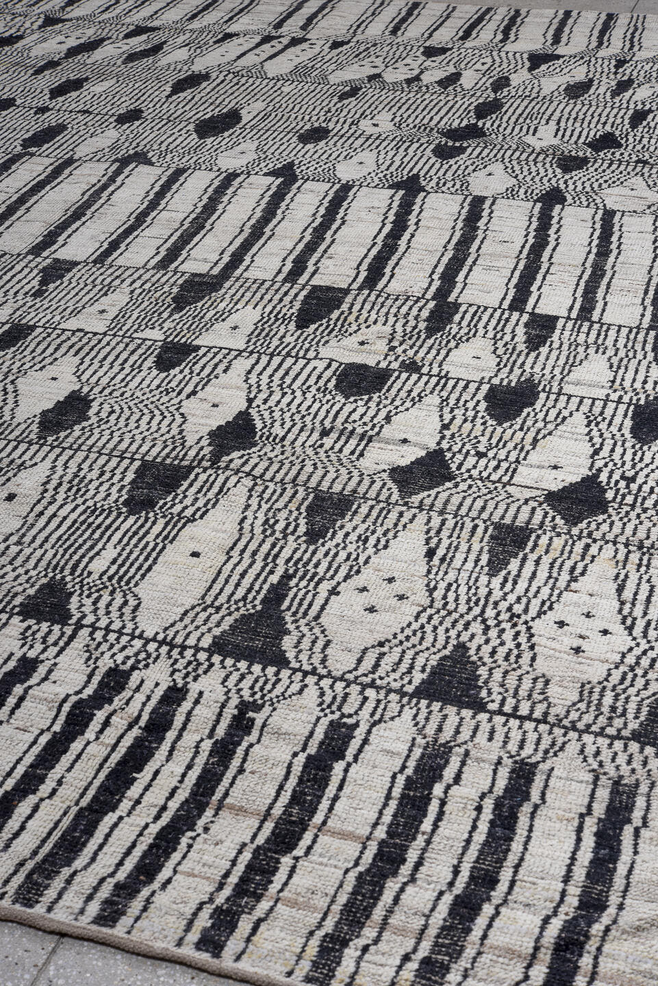 11' x 14' one-of-a-kind handmade vintage Tulu oversize rug. Color palette: ivory, charcoal, taupe, gray, black, beige