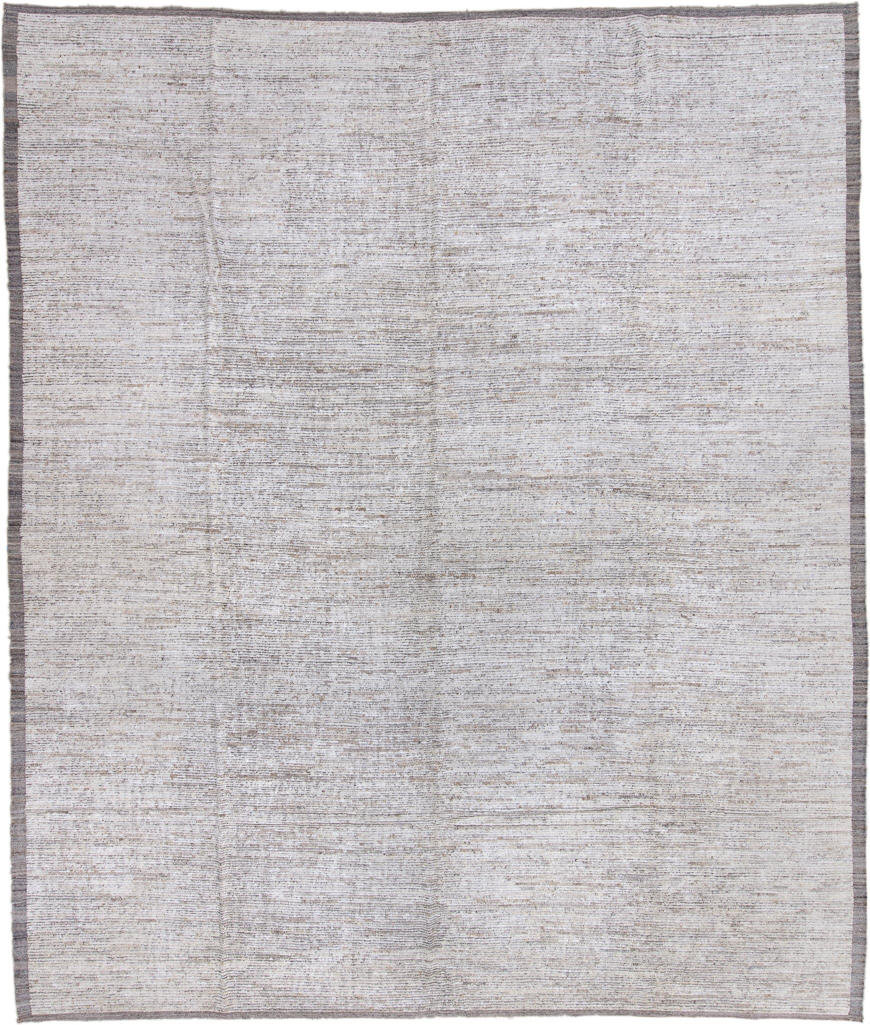 13' x 16' one-of-a-kind handmade vintage Tulu oversize rug. Color palette: ivory, taupe, gray, greige, beige