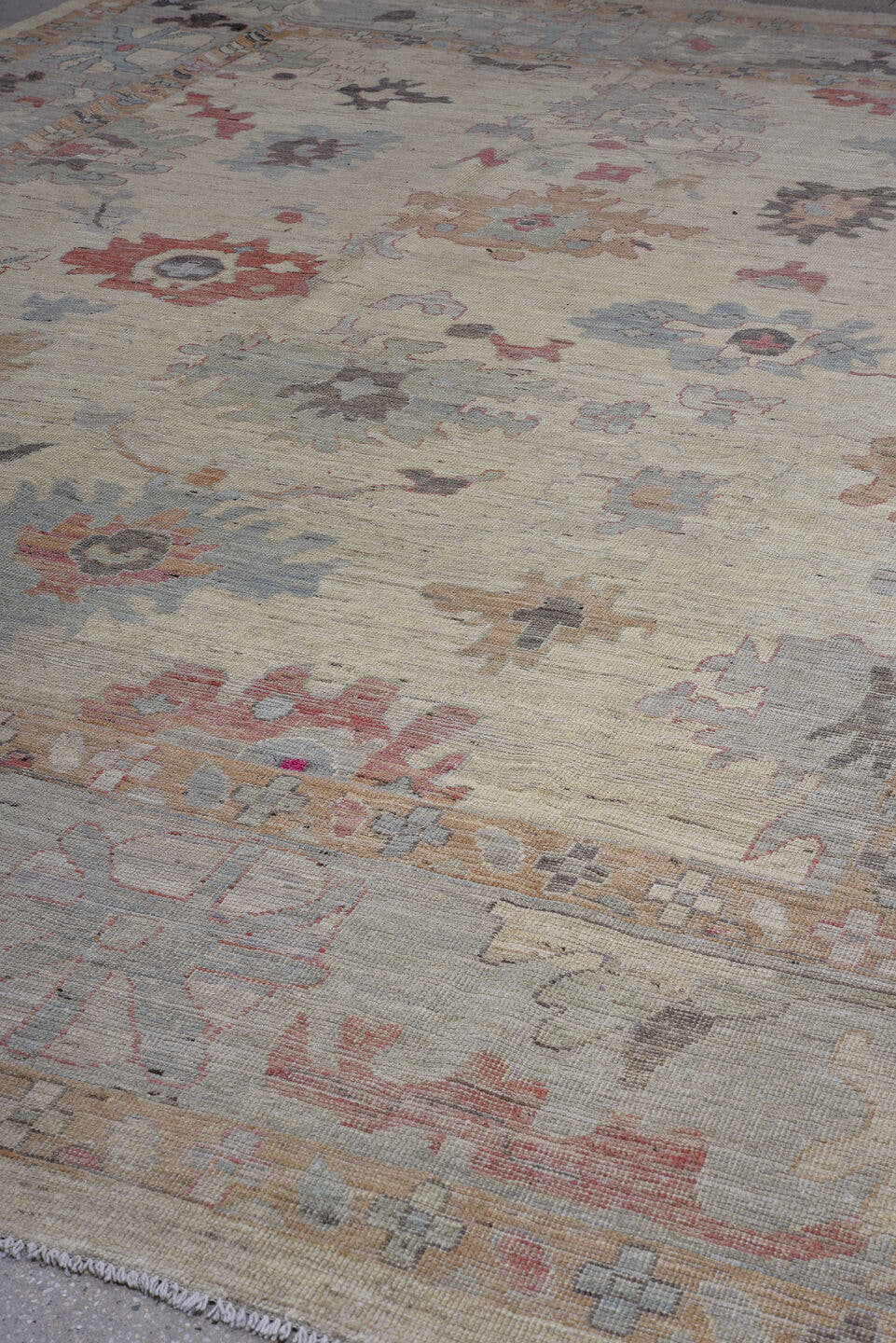 11' x 14' one-of-a-kind handmade vintage Oushak oversize rug. Color palette: ivory, beige, pale blue, blush, taupe, sand