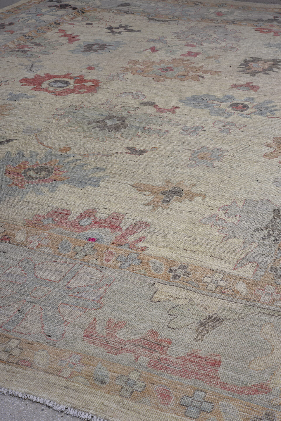 11' x 14' one-of-a-kind handmade vintage Oushak oversize rug. Color palette: ivory, beige, pale blue, blush, taupe, sand