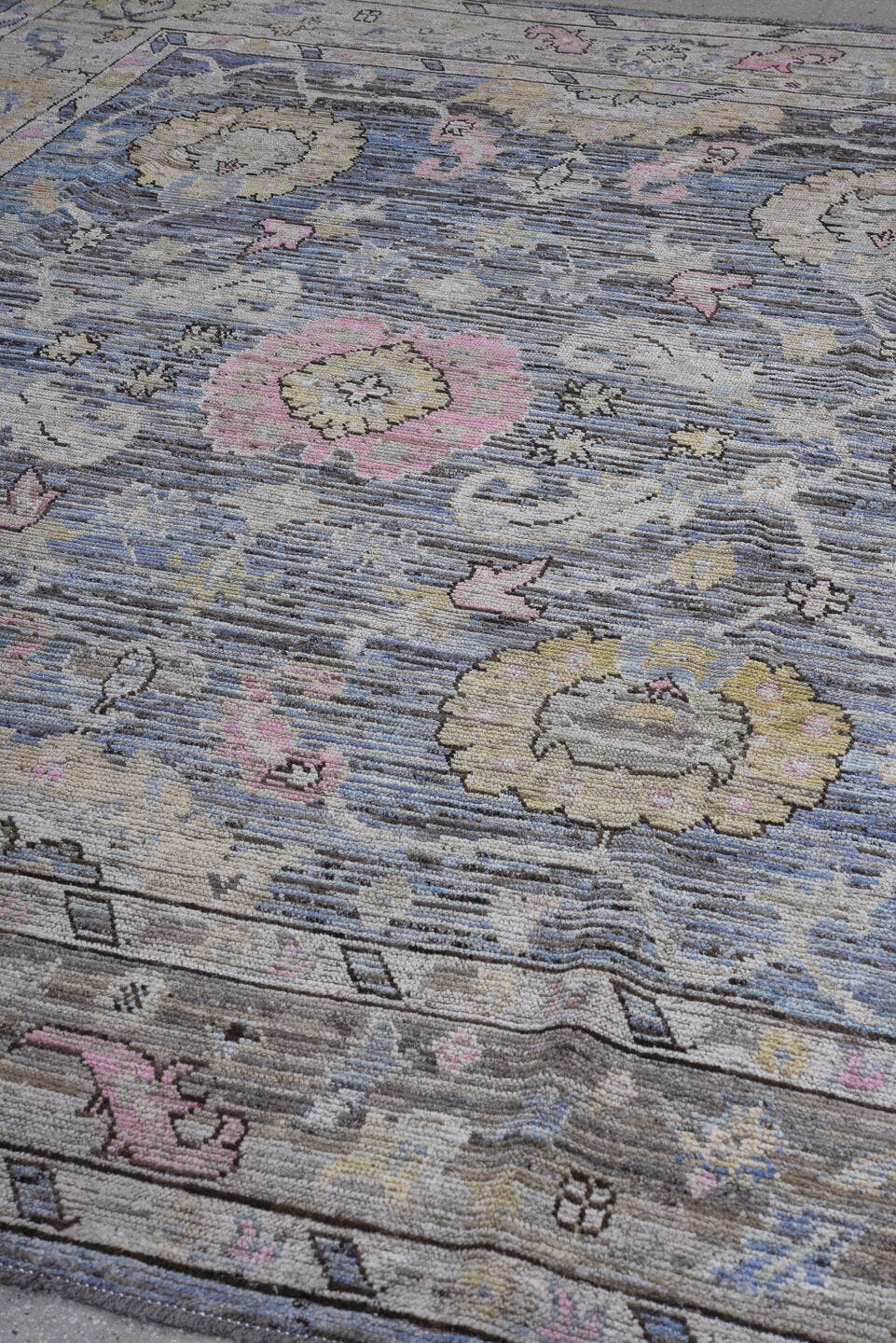 9' x 11' one-of-a-kind handmade vintage Oushak large size rug. Color palette: blue, ivory, taupe, pink, beige, charcoal