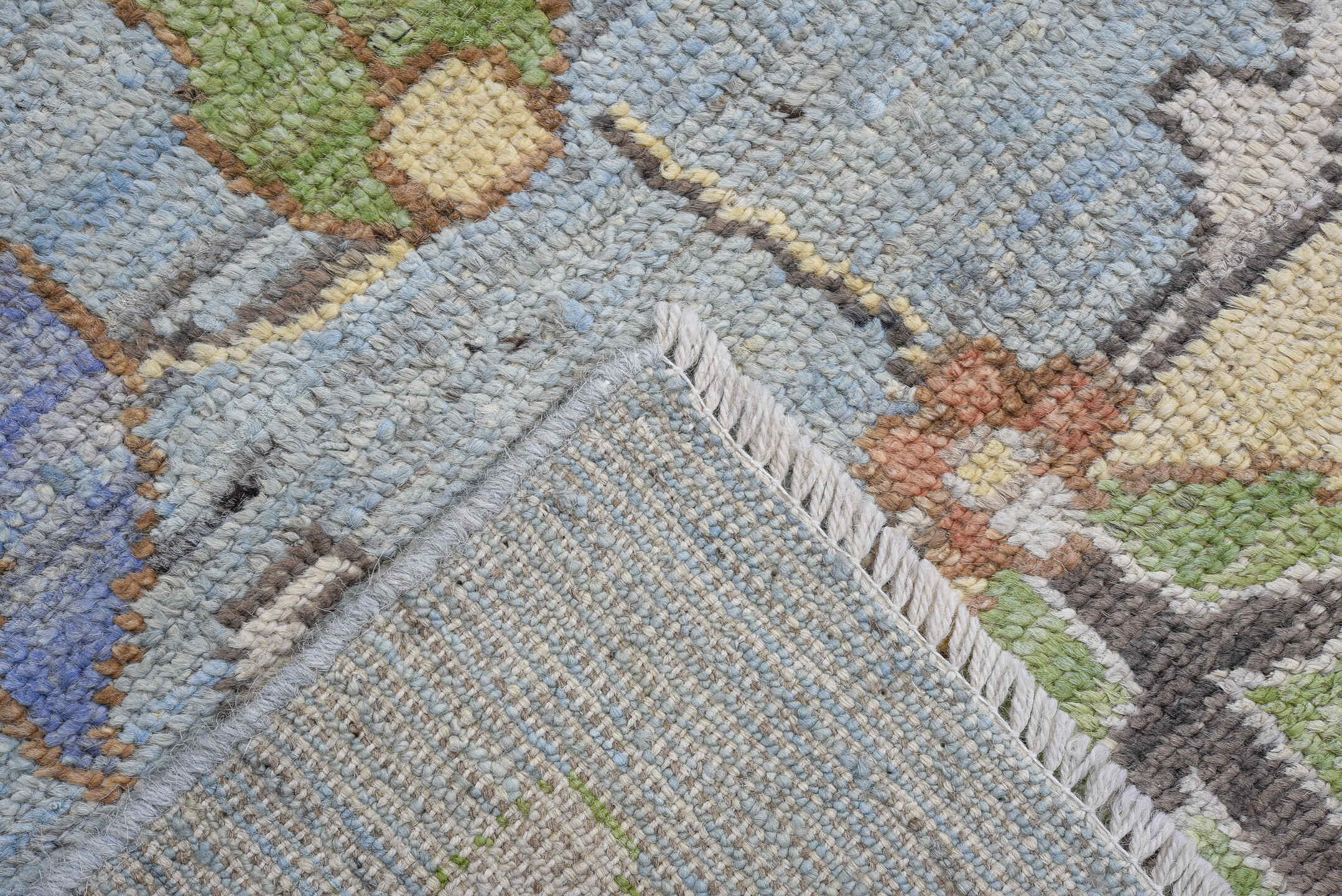 8' x 12' one-of-a-kind handmade vintage Oushak large size rug. Color palette: light blue, ivory, rust, sage, brown, lavender
