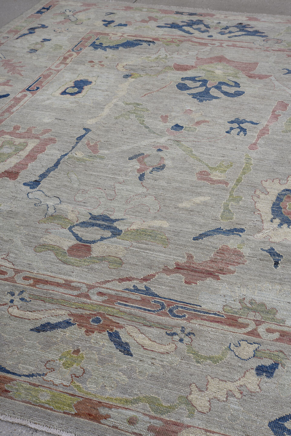 7' x 9' one-of-a-kind handmade vintage Oushak rug. Color palette: ivory, blush, sage, navy, taupe, rose, pink, green, blue
