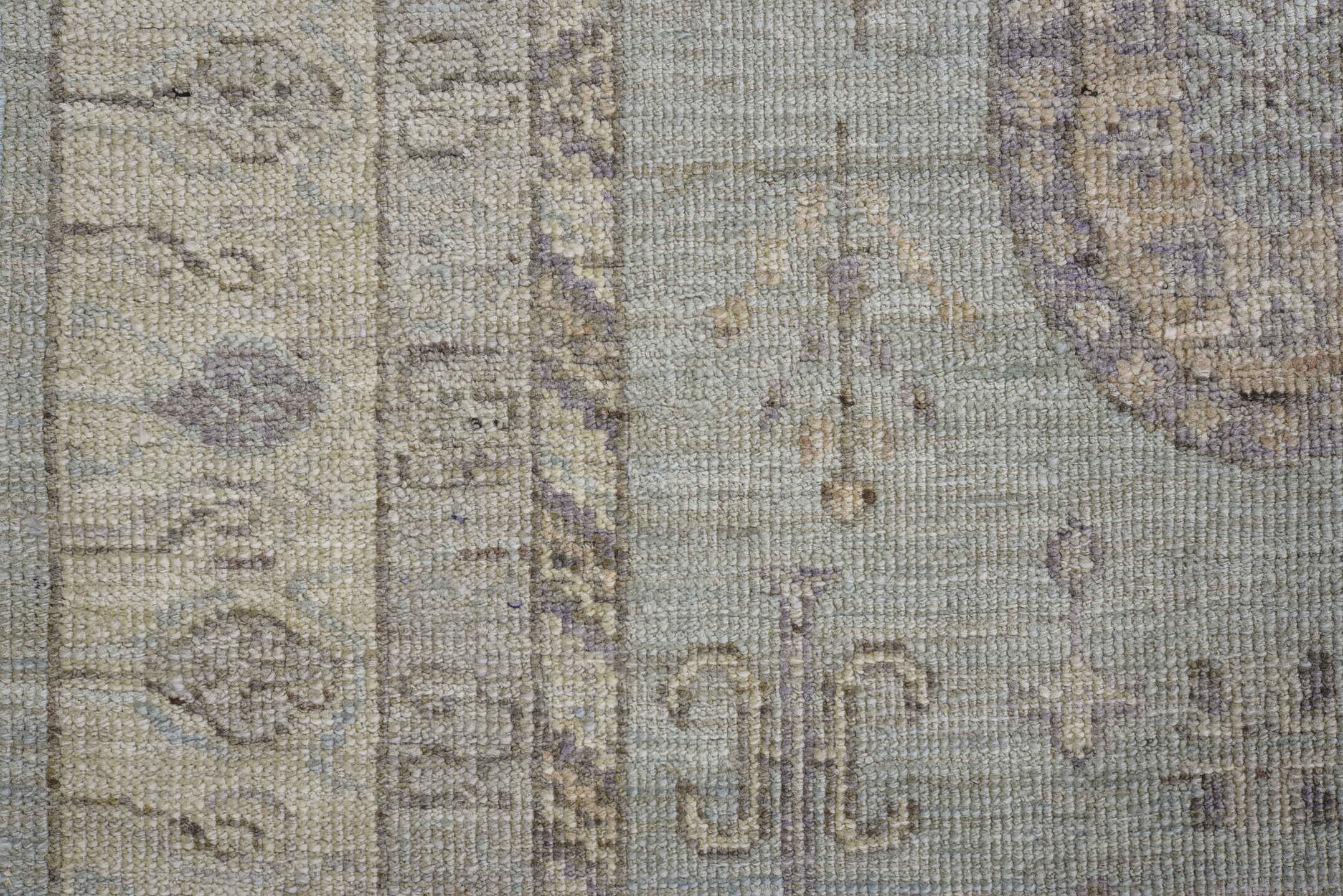 3' x 9' one-of-a-kind handmade vintage Oushak runner rug. Color palette: ivory, pale blue, taupe, lavender, beige, gray