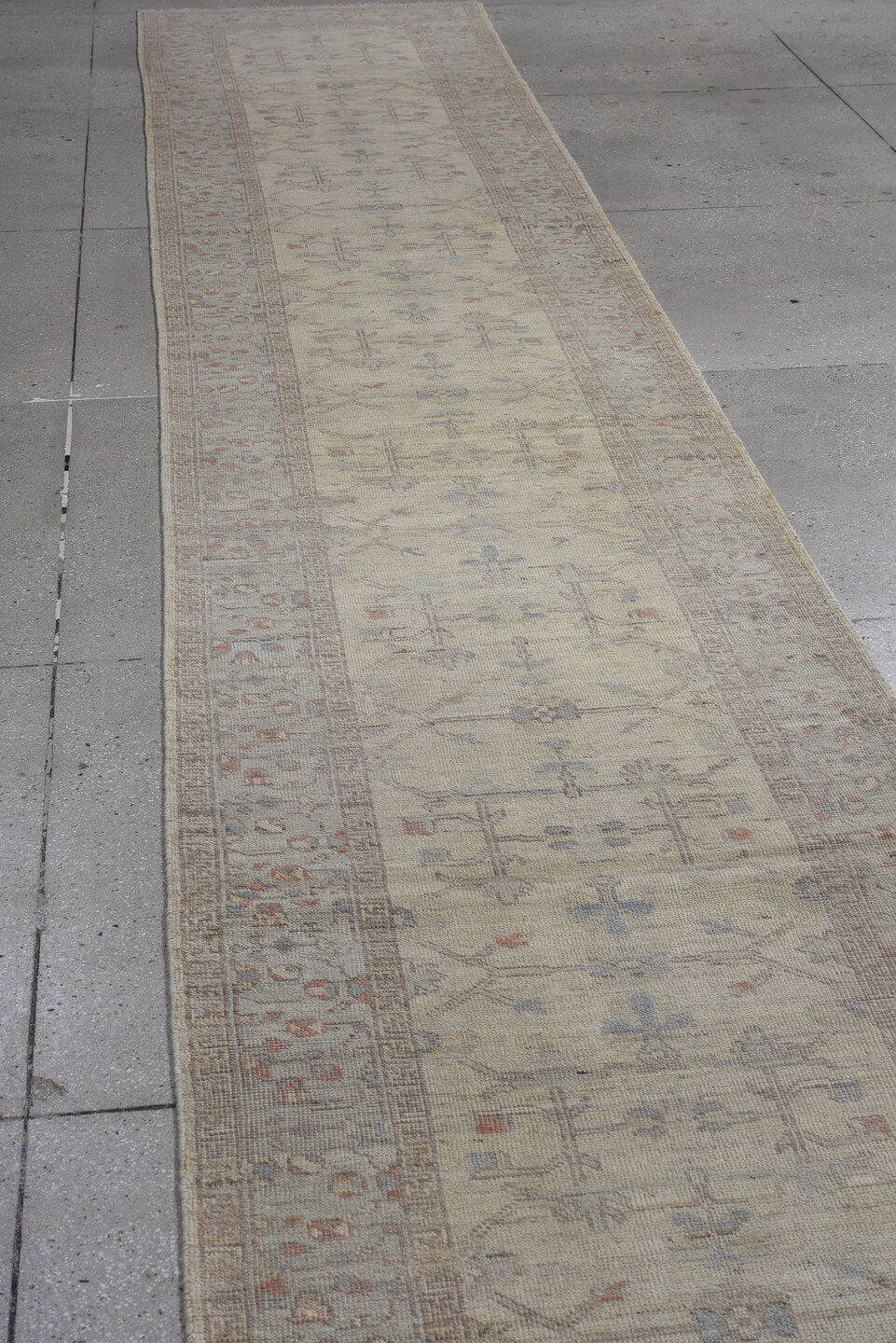 3' x 19' one-of-a-kind handmade vintage Oushak runner rug. Color palette: ivory, taupe, beige, soft blue, rust, gray