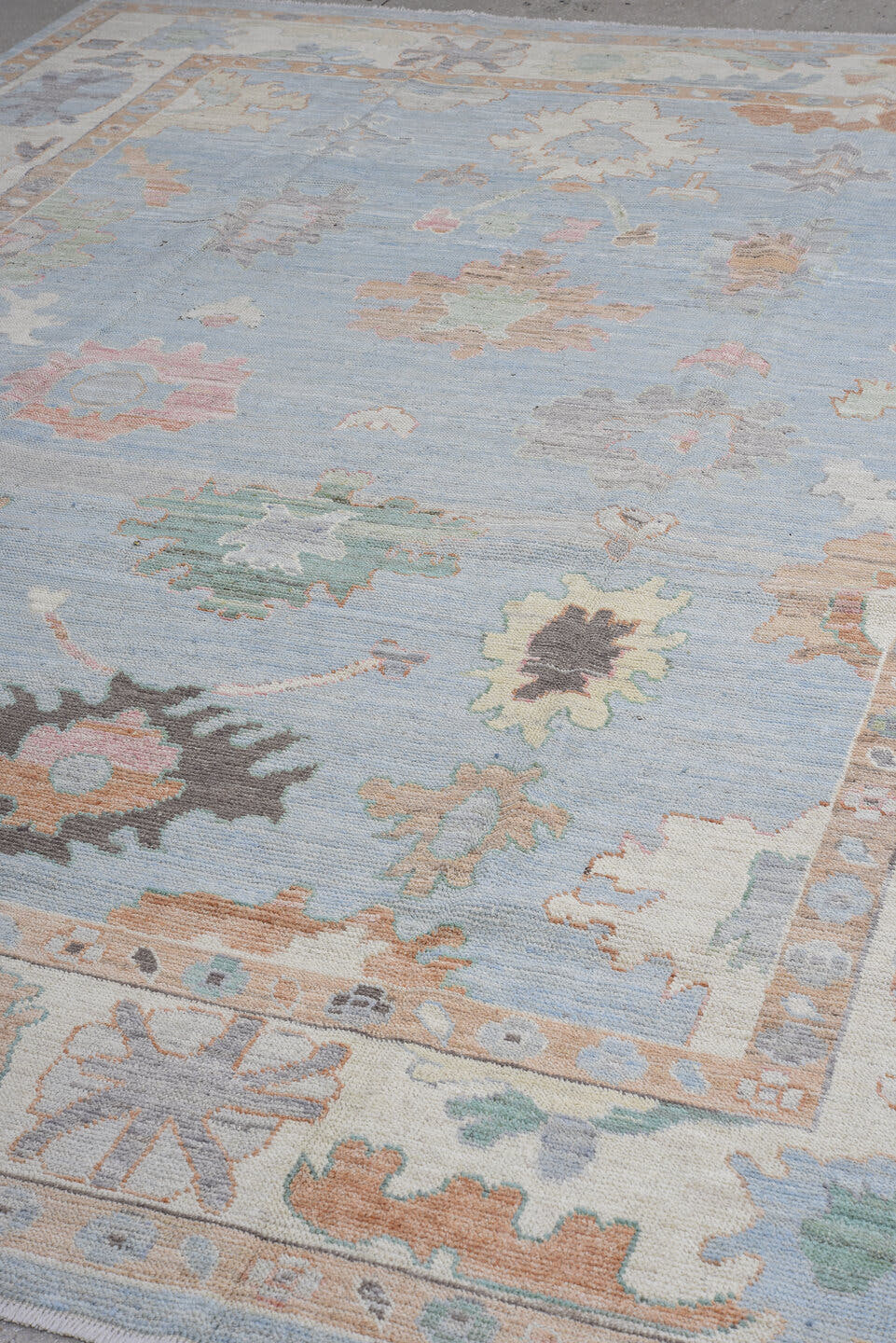 9' x 12' one-of-a-kind handmade vintage Oushak large size rug. Color palette: sky blue, ivory, beige, sage, slate