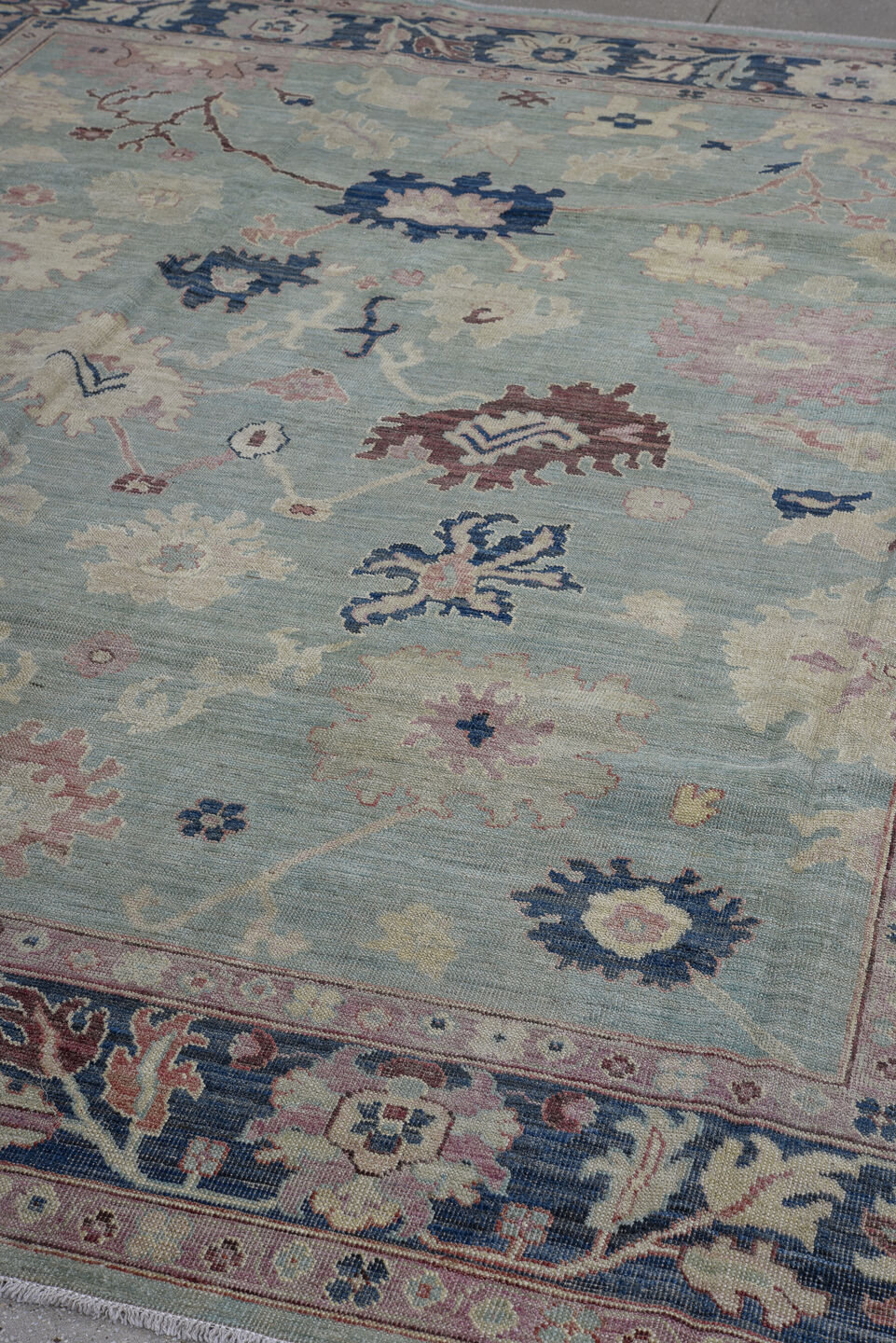 8' x 9' one-of-a-kind handmade vintage Oushak large size rug. Color palette: aqua, navy, ivory, blush, taupe, brown, teal
