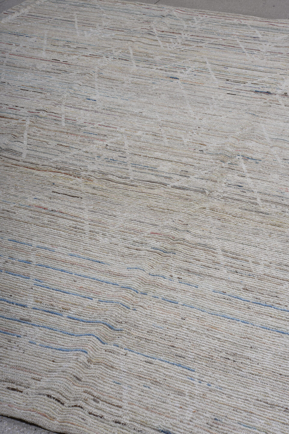 9' x 11' one-of-a-kind handmade vintage Tulu large size rug. Color palette: ivory, beige, taupe, pale blue, rust, charcoal