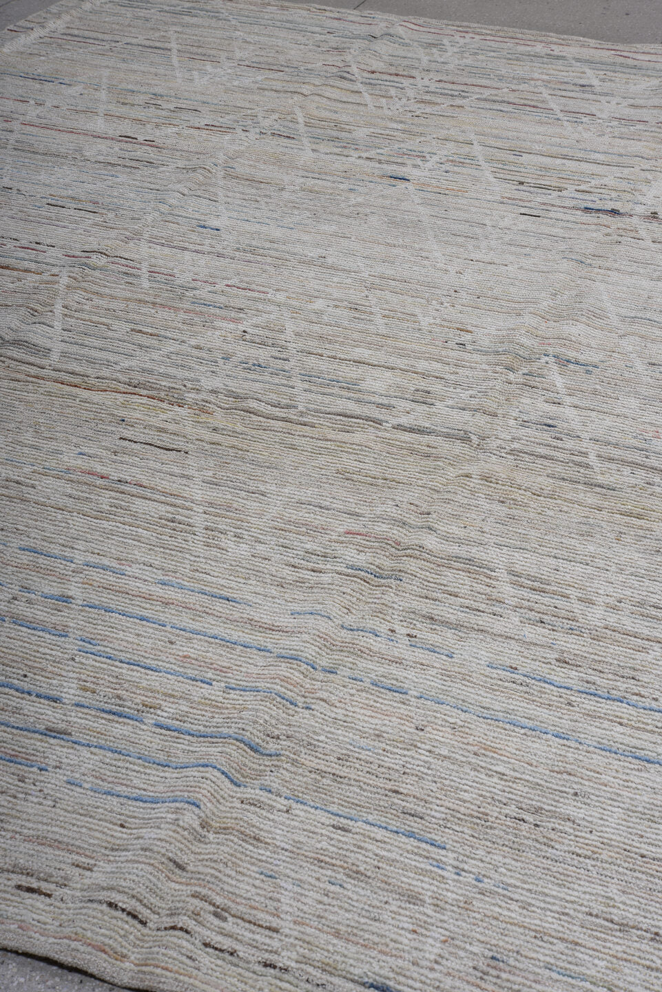 9' x 11' one-of-a-kind handmade vintage Tulu large size rug. Color palette: ivory, beige, taupe, pale blue, rust, charcoal