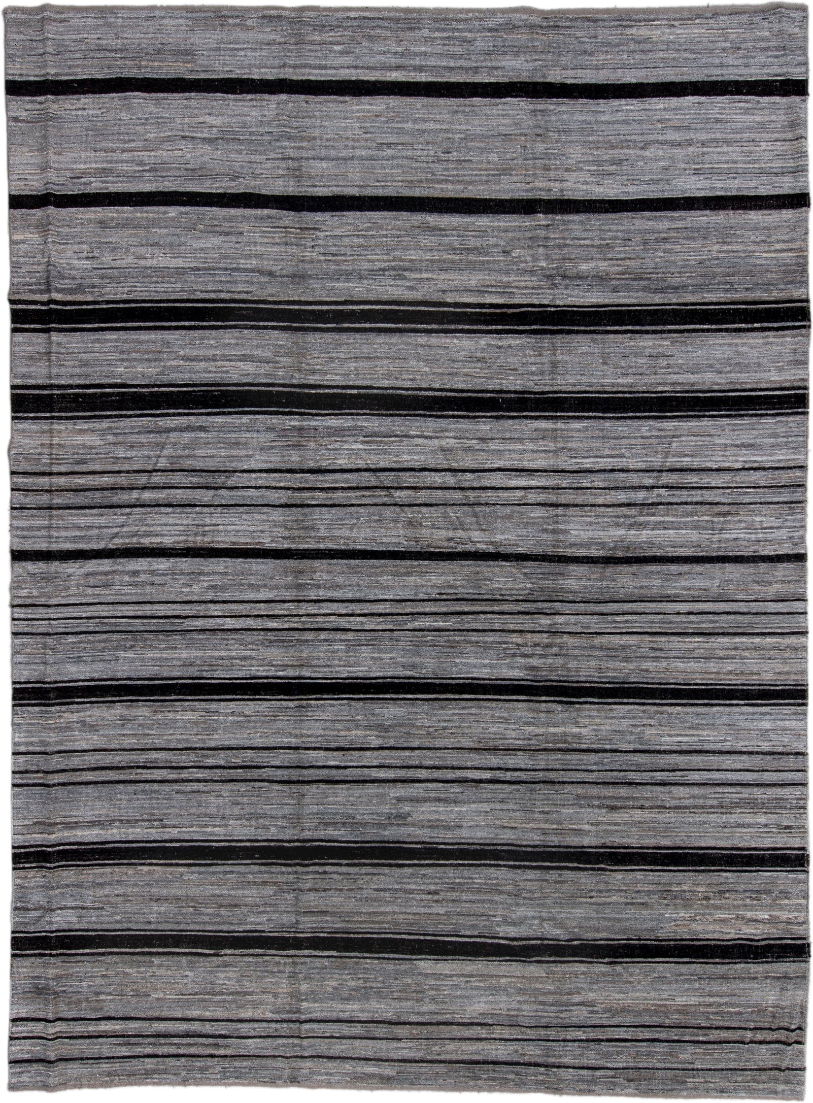 10' x 13' one-of-a-kind handmade vintage Tulu large size rug. Color palette: gray, charcoal, ivory, black
