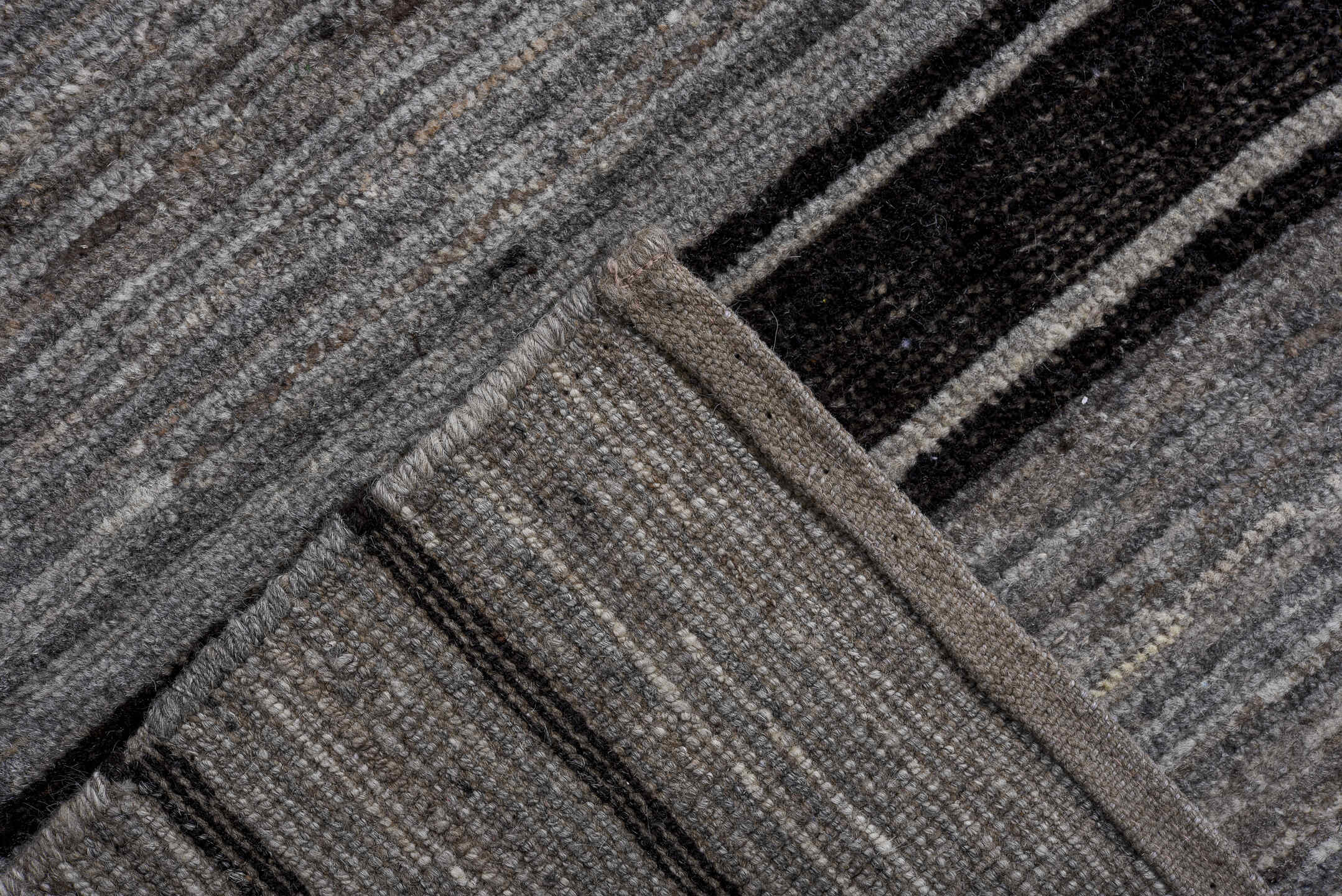 10' x 13' one-of-a-kind handmade vintage Tulu large size rug. Color palette: gray, charcoal, ivory, black