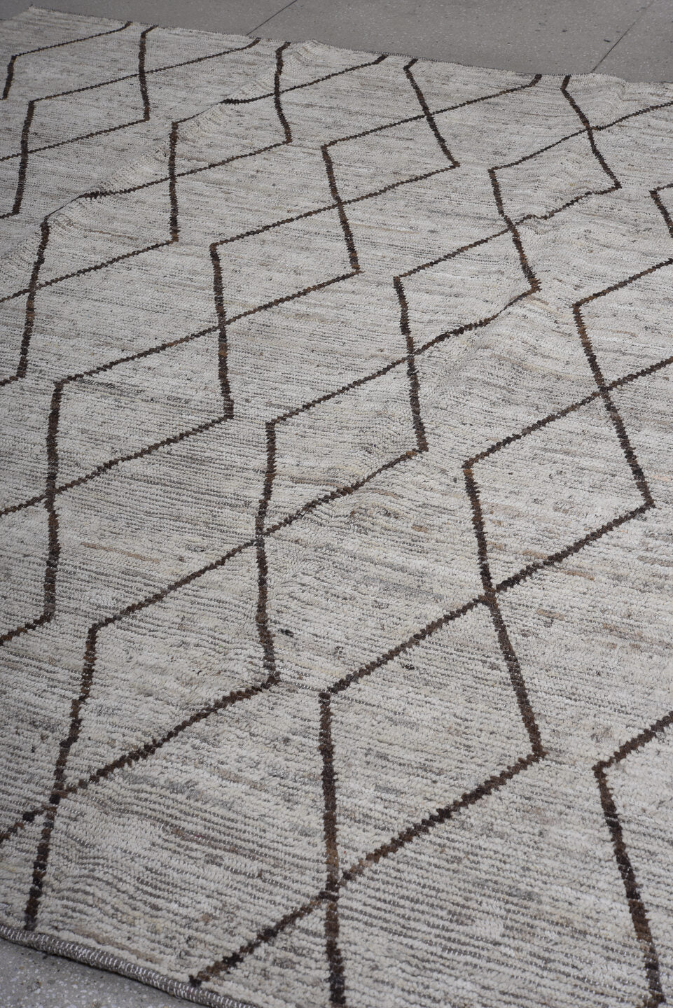 8' x 9' one-of-a-kind handmade vintage Tulu large size rug. Color palette: ivory, charcoal, taupe, gray, black, beige