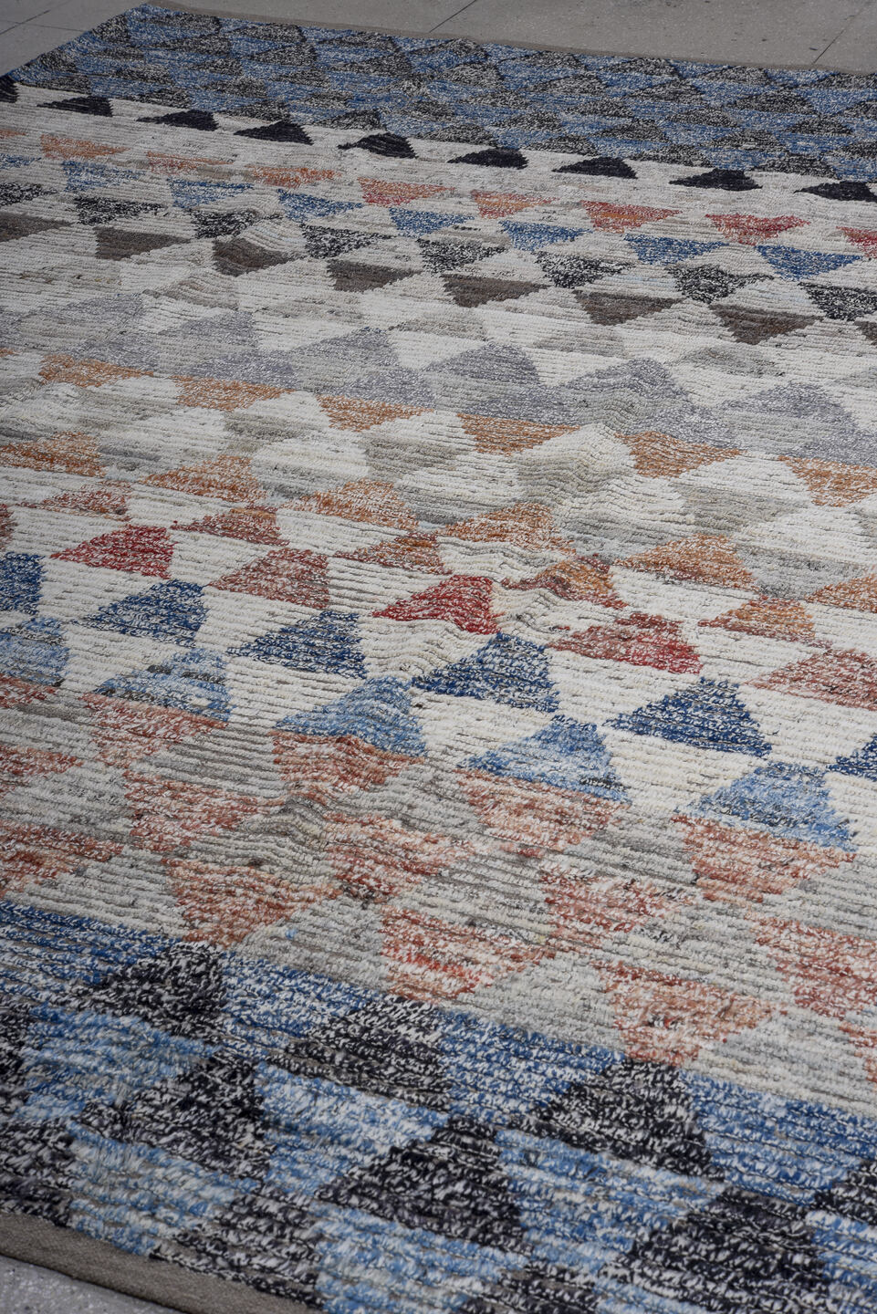 9' x 12' one-of-a-kind handmade vintage Tulu large size rug. Color palette: ivory, blue, charcoal, slate, rust, taupe