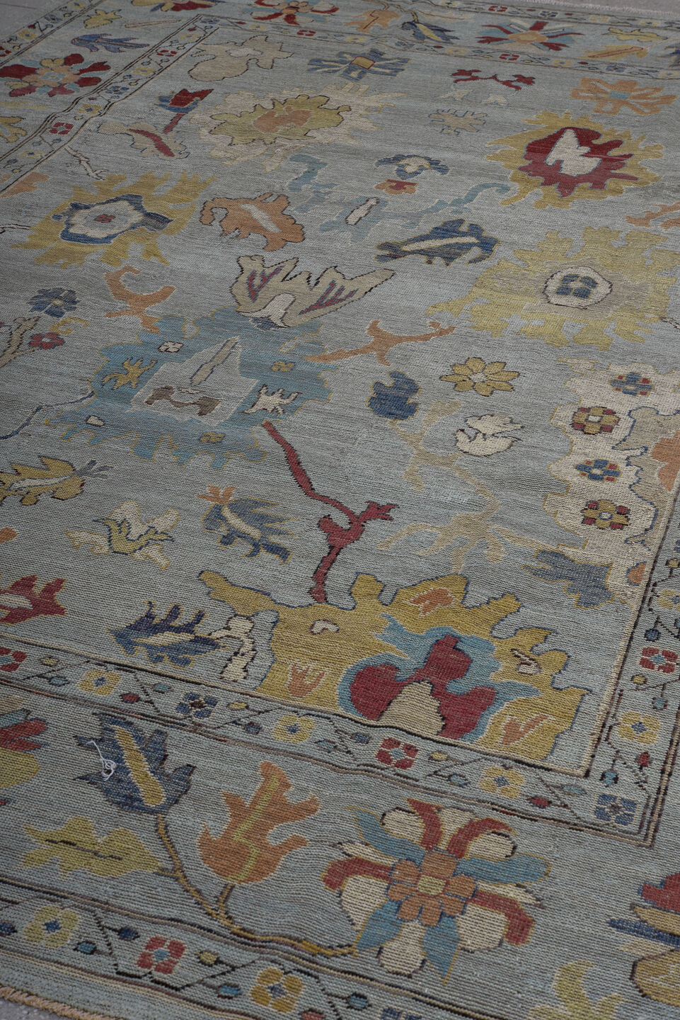 8' x 11' one-of-a-kind handmade vintage Oushak large size rug. Color palette: pale blue, ivory, gold, rust, navy, taupe