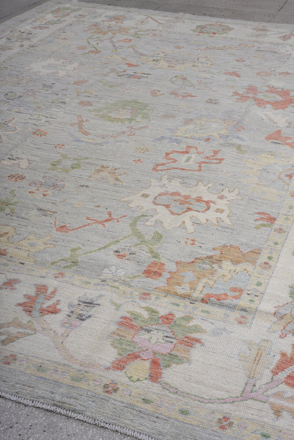 9' x 13' one-of-a-kind handmade vintage Oushak large size rug. Color palette: ivory, sage, coral, taupe, muted blue, beige