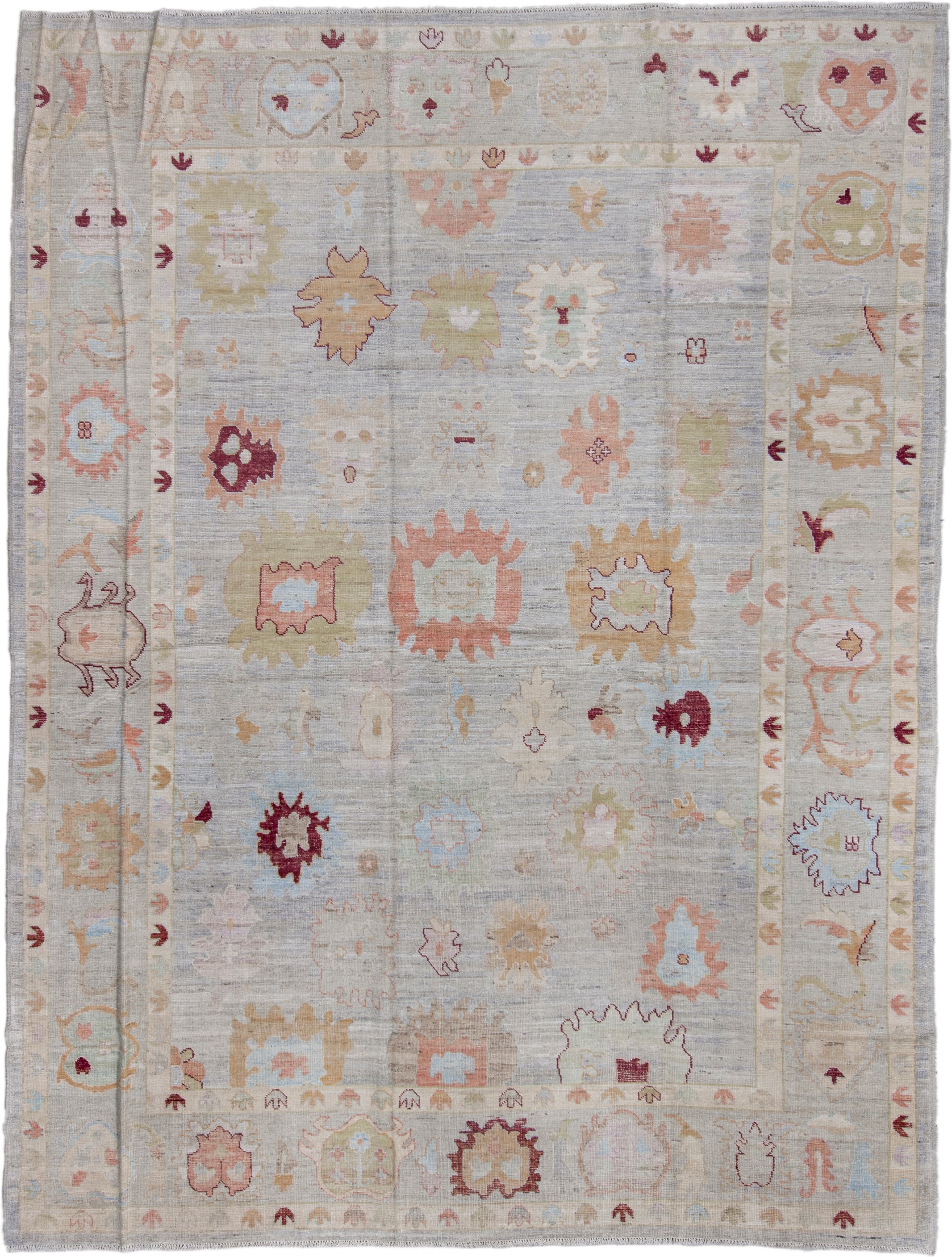 10' x 13' one-of-a-kind handmade vintage Oushak large size rug. Color palette: pale blue, ivory, blush, sage, gold, burgundy