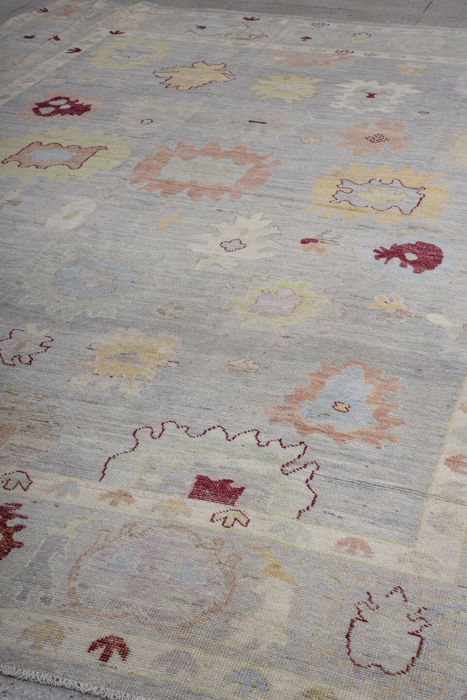 10' x 13' one-of-a-kind handmade vintage Oushak large size rug. Color palette: pale blue, ivory, blush, sage, gold, burgundy