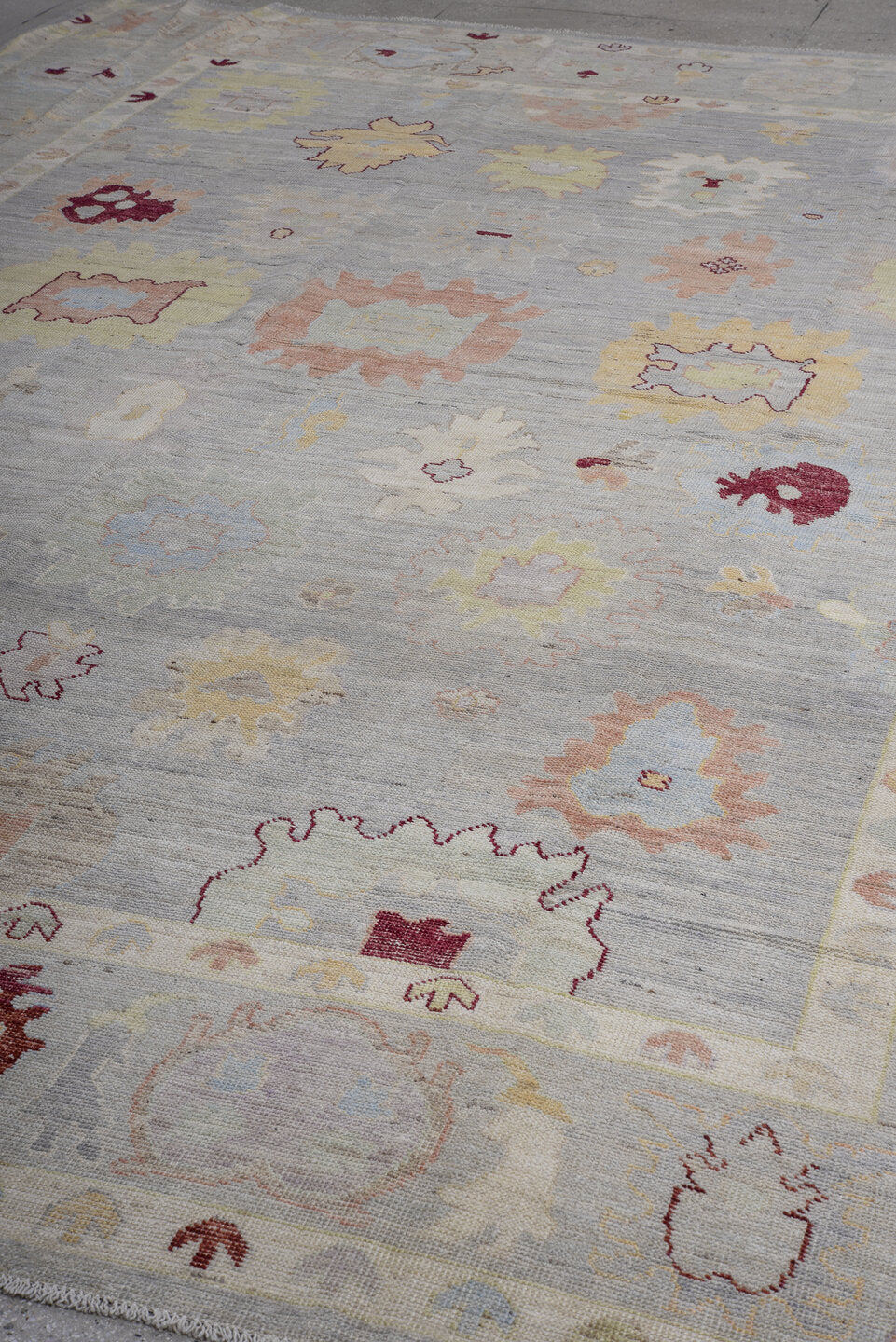10' x 13' one-of-a-kind handmade vintage Oushak large size rug. Color palette: pale blue, ivory, blush, sage, gold, burgundy