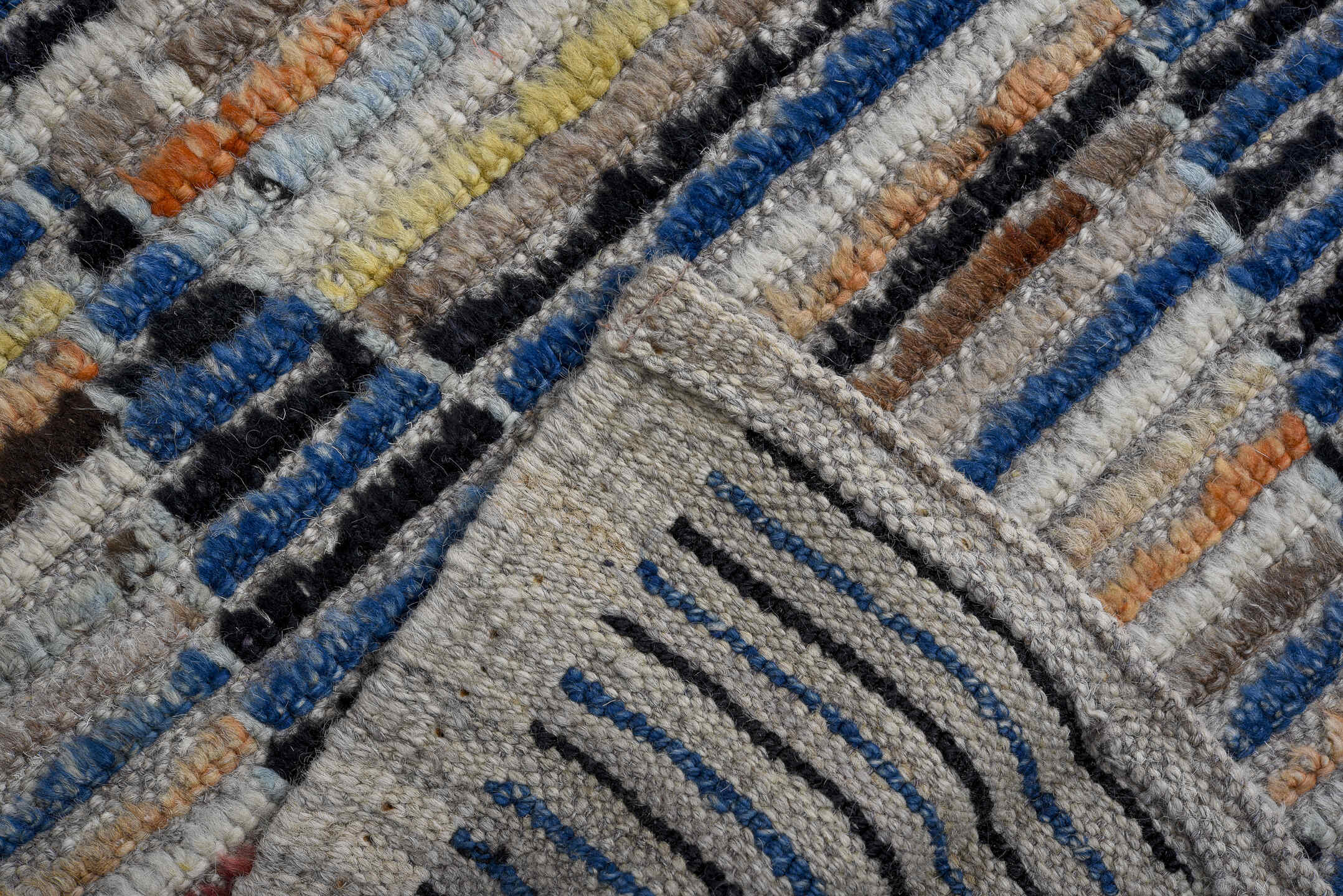 9' x 11' one-of-a-kind handmade vintage Tulu large size rug. Color palette: ivory, indigo, taupe, terra cotta, charcoal
