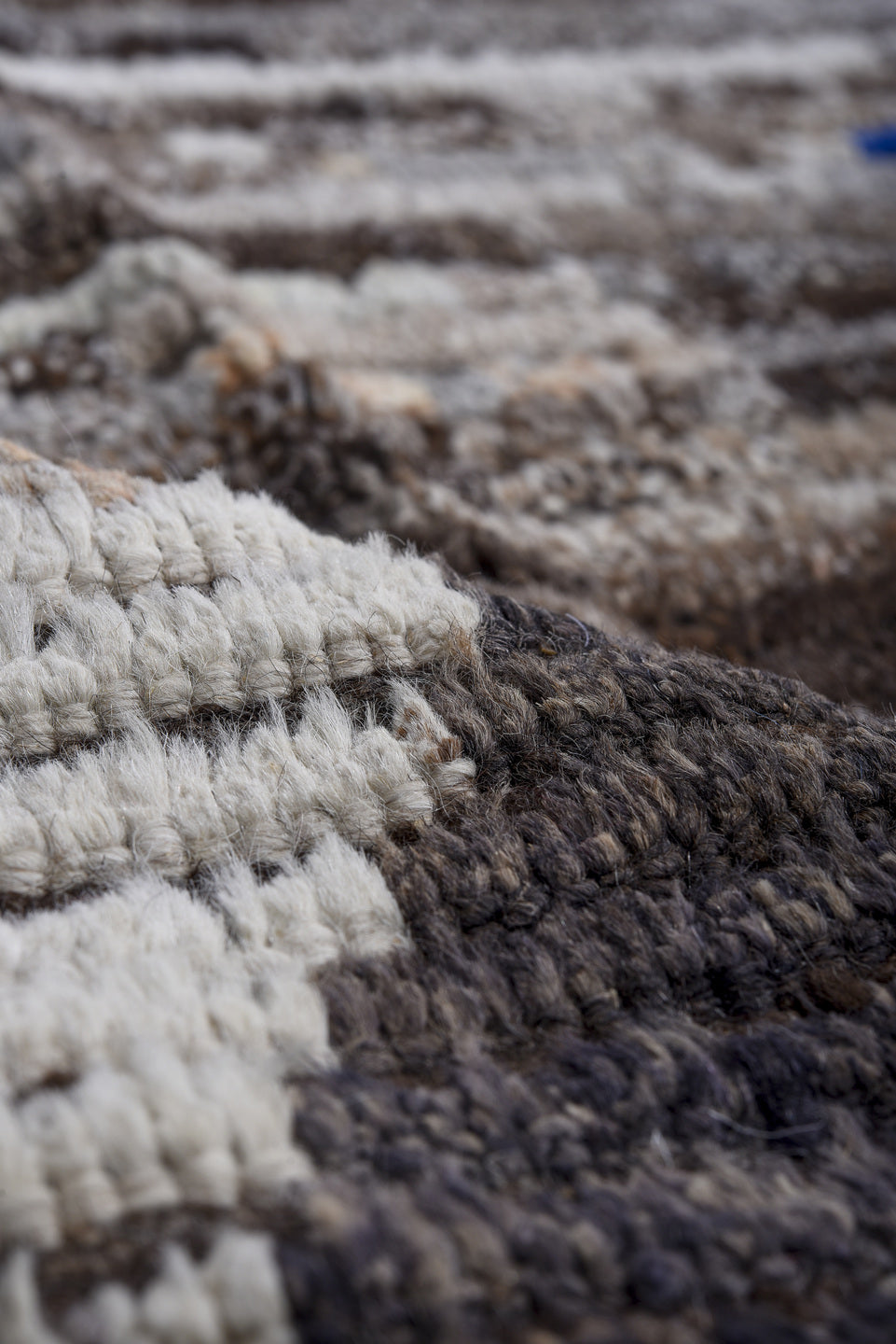 11' x 13' one-of-a-kind handmade vintage Tulu oversize rug. Color palette: brown, ivory, charcoal, sky blue, crimson, gray
