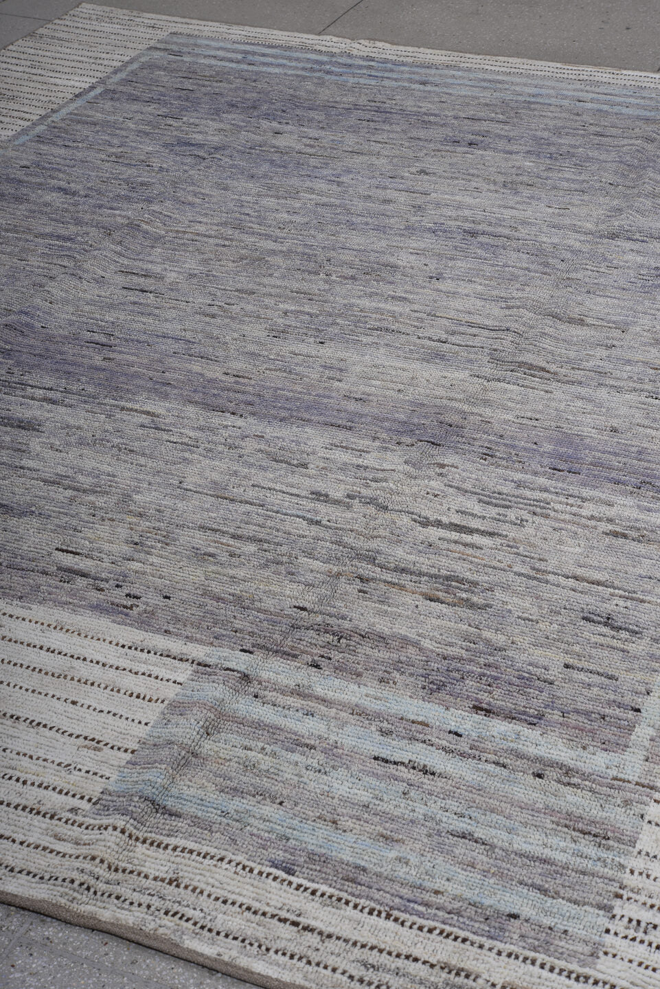 8' x 9' one-of-a-kind handmade vintage Tulu large size rug. Color palette: slate, ivory, gray, charcoal, pale blue, black