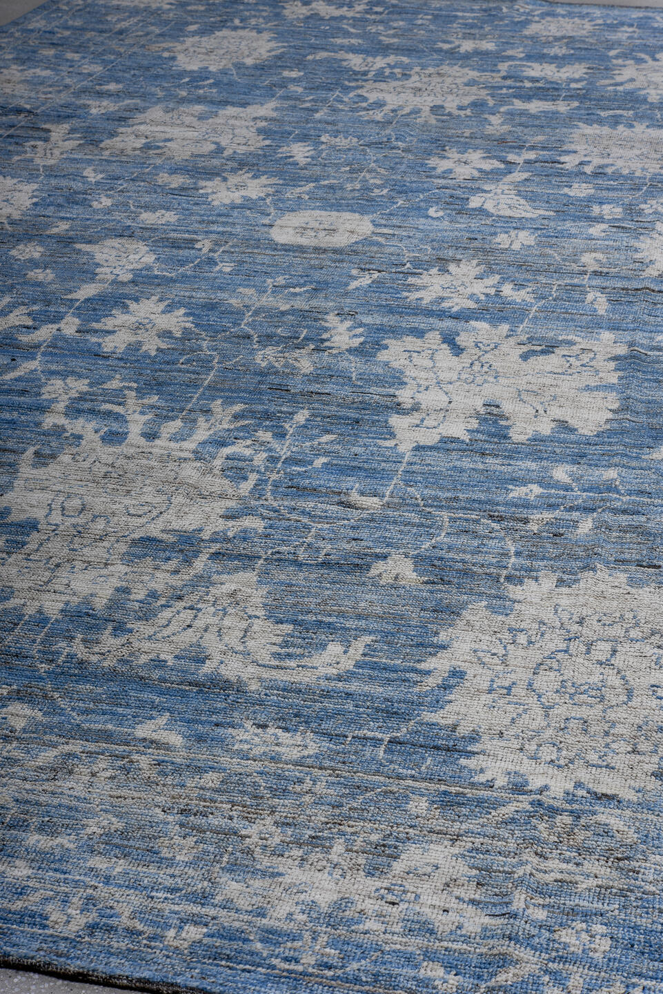 11' x 18' one-of-a-kind handmade vintage Oushak oversize rug. Color palette: sky blue, ivory, slate, denim, cream