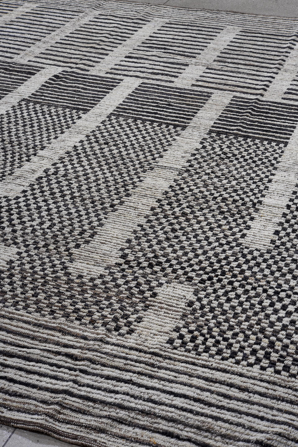 9' x 12' one-of-a-kind handmade vintage Tulu large size rug. Color palette: ivory, charcoal, brown, taupe, gray, black