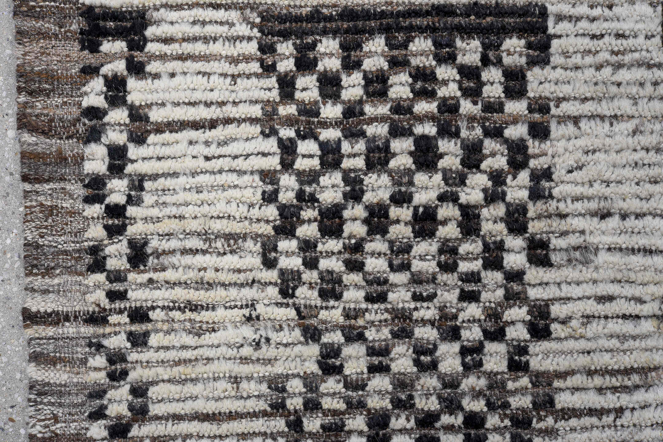 9' x 12' one-of-a-kind handmade vintage Tulu large size rug. Color palette: ivory, charcoal, brown, taupe, gray, black