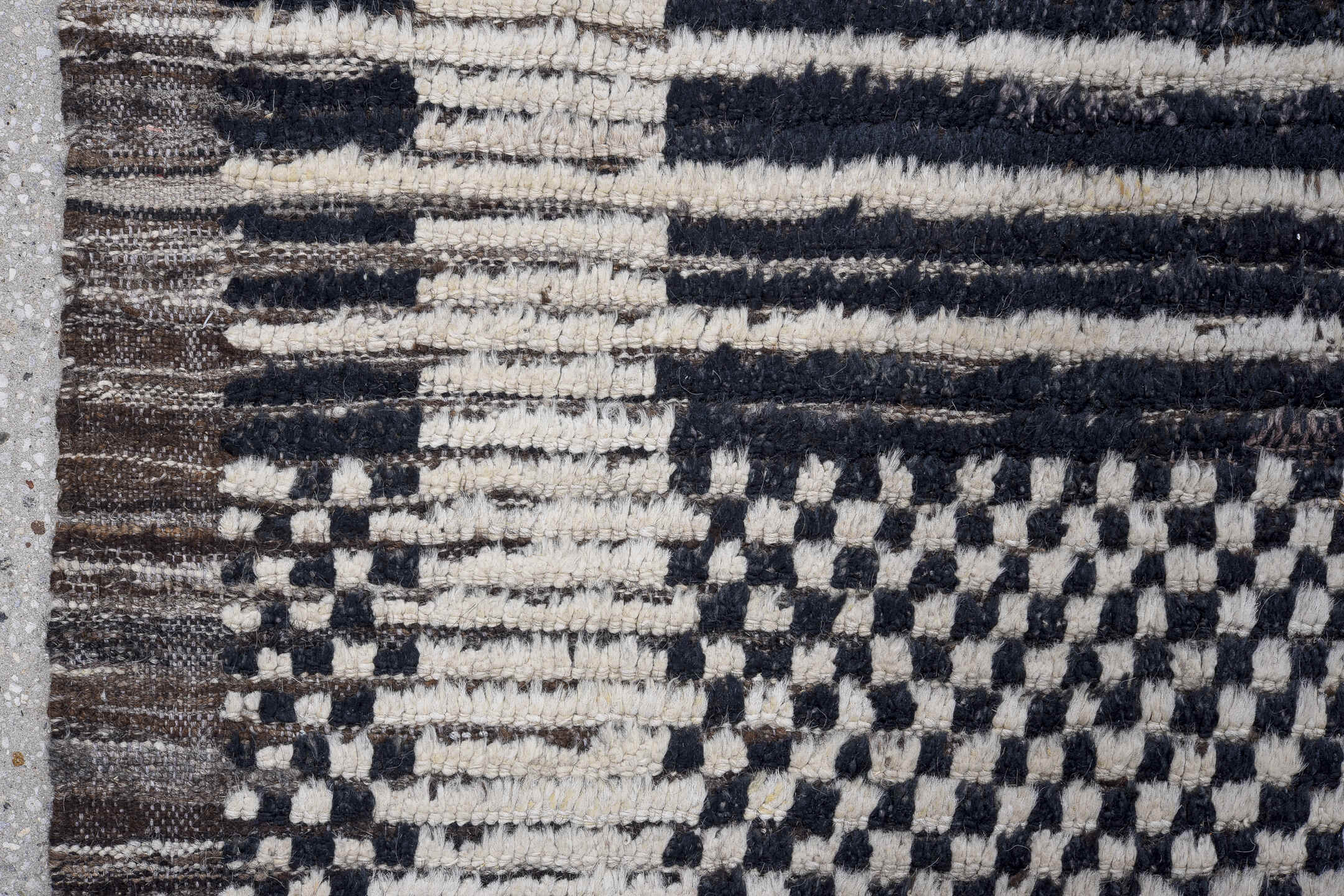 10' x 14' one-of-a-kind handmade vintage Tulu large size rug. Color palette: ivory, charcoal, slate, taupe, gray, black