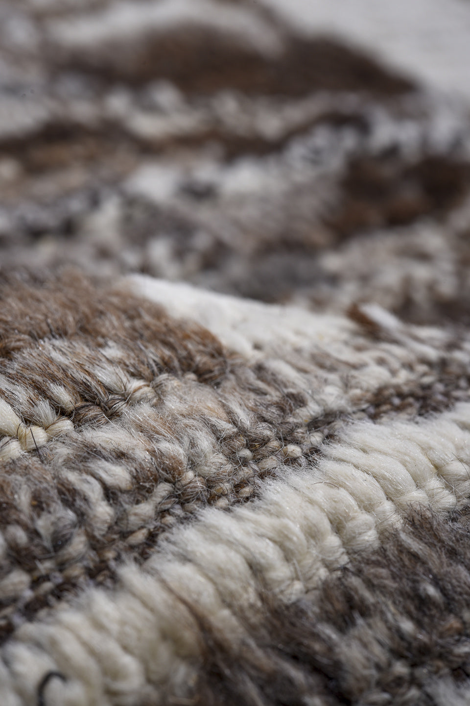 13' x 16' one-of-a-kind handmade vintage Tulu oversize rug. Color palette: charcoal, ivory, taupe, brown, slate, gray, black