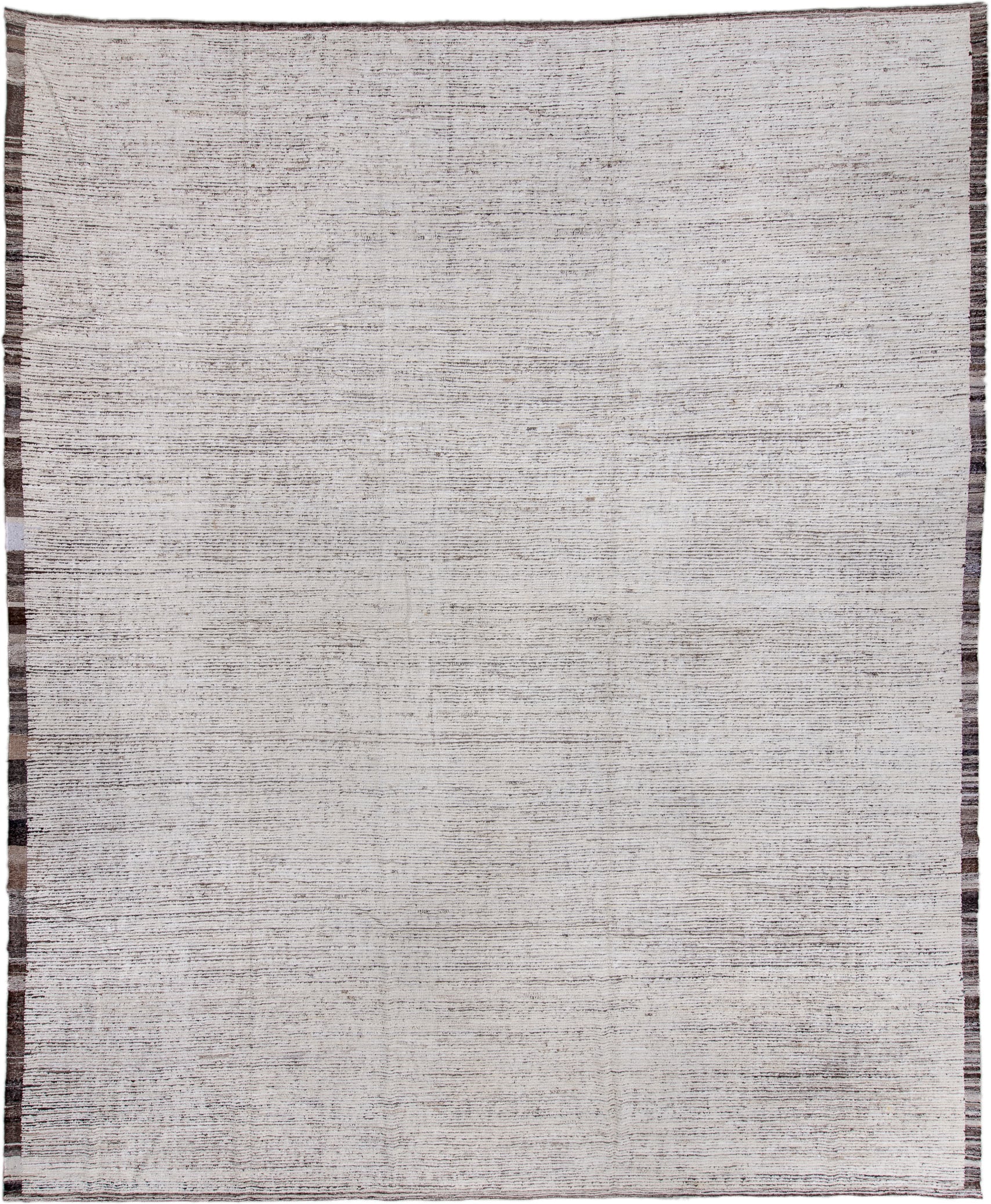 13' x 16' one-of-a-kind handmade vintage Tulu oversize rug. Color palette: ivory, charcoal, taupe, brown, gray, black, beige